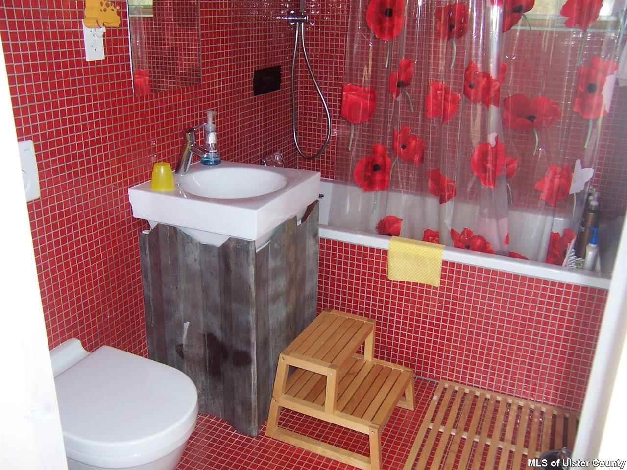 4896 Vega Mountain Road Roxbury, NY 12474 - Photo 6 of 14 a bathroom with a sink toilet and shower