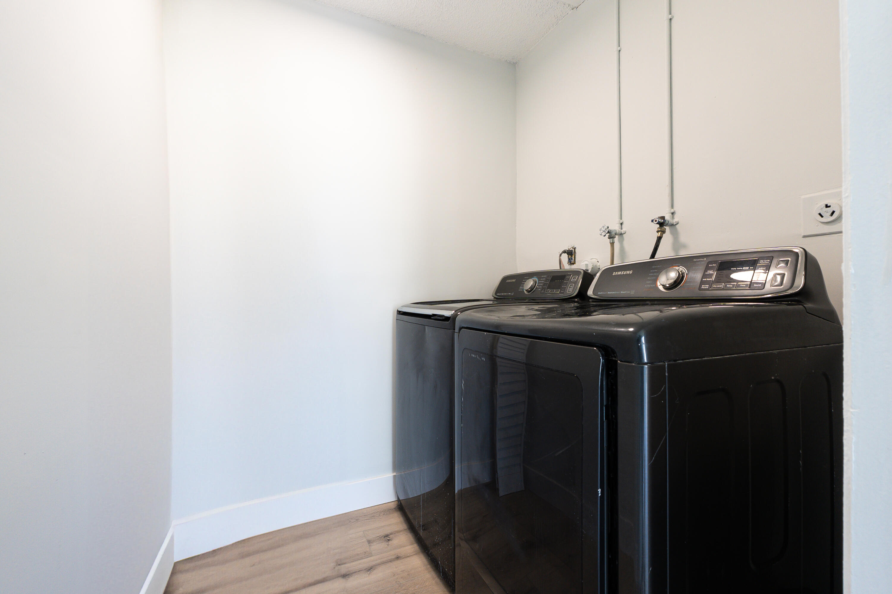 314 Monaco Boulevard, Unit G Delray Beach, FL 33446 - Photo 25 of 26 a utility room with dryer and washer