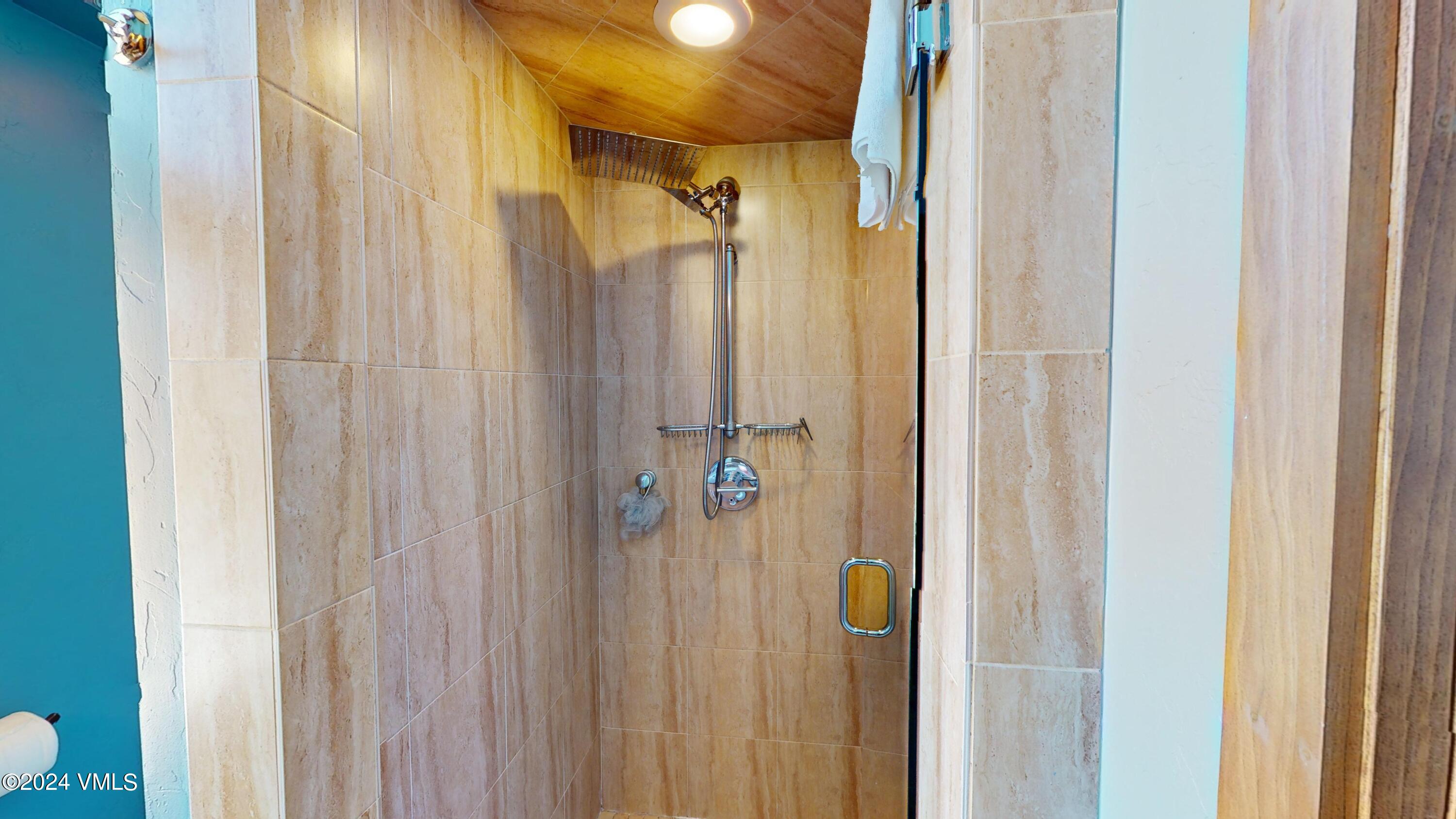 314 Eagle Road, Unit B1 Avon, CO 81620 - Photo 12 of 24 a bathroom with a shower