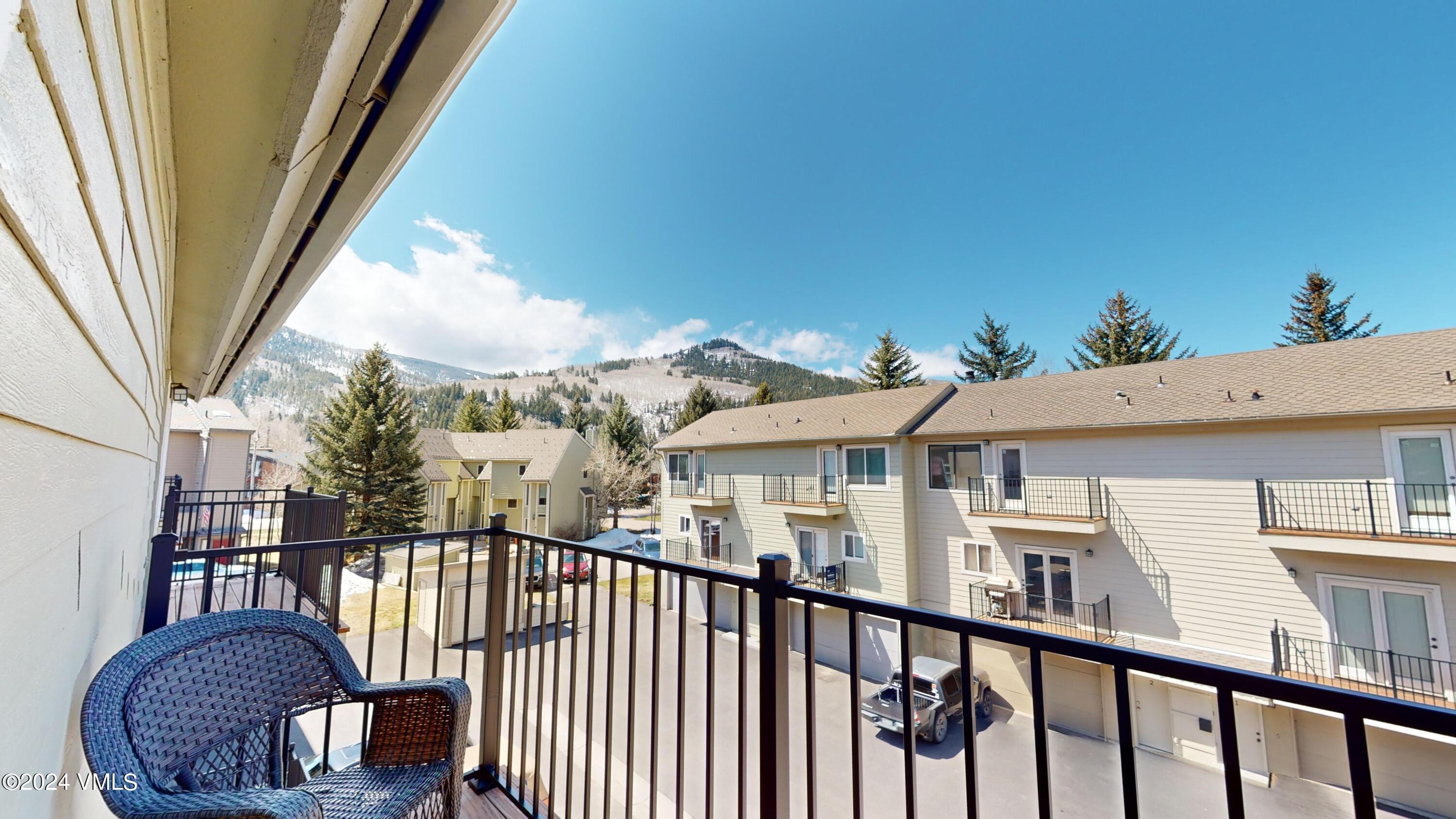 314 Eagle Road, Unit B1 Avon, CO 81620 - Photo 20 of 24 a view of a balcony with an outdoor seating