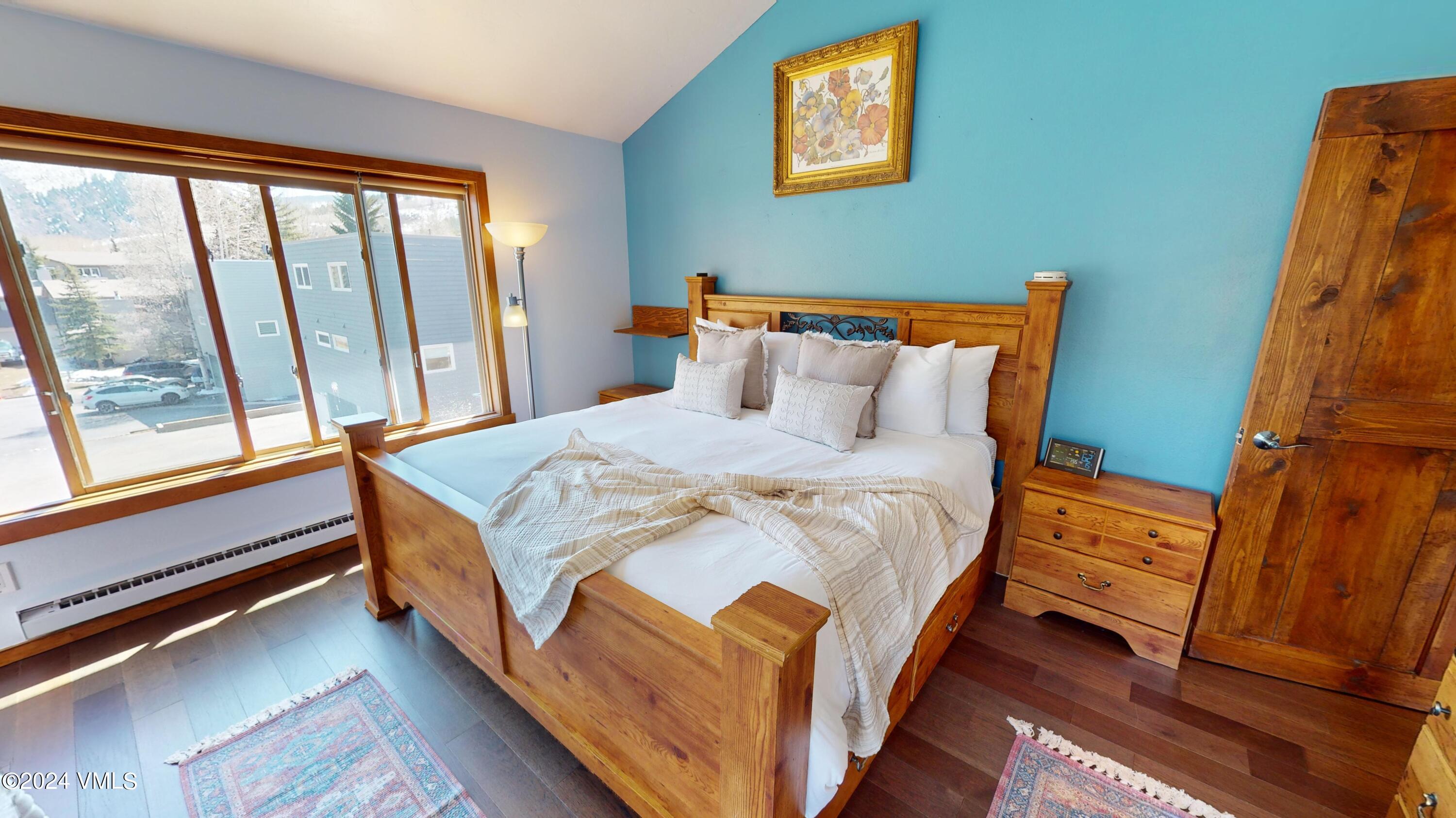 314 Eagle Road, Unit B1 Avon, CO 81620 - Photo 9 of 24 a bedroom with a bed and a window