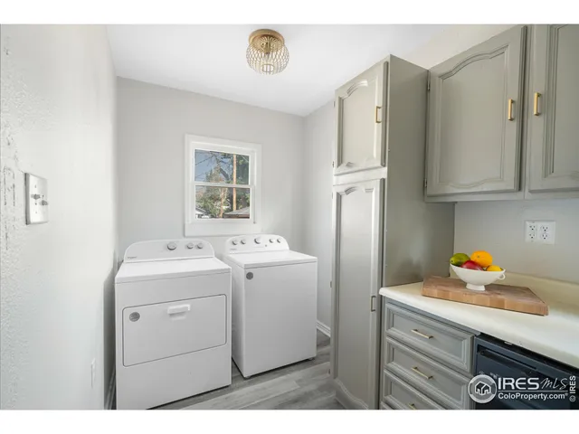 a utility room with closet dryer and washer