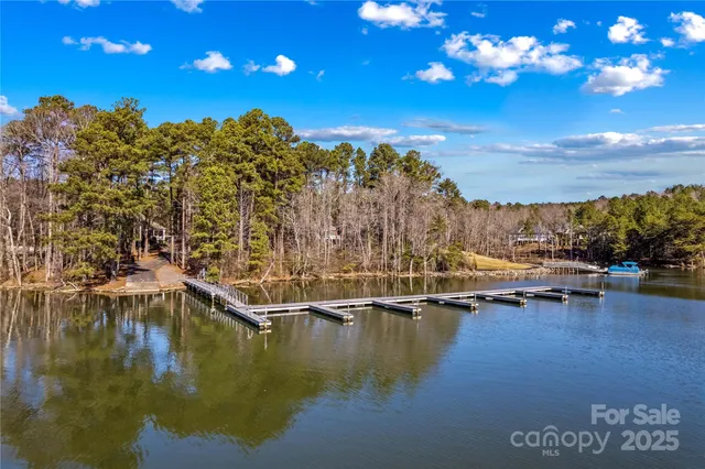 a view of a street with cars parked