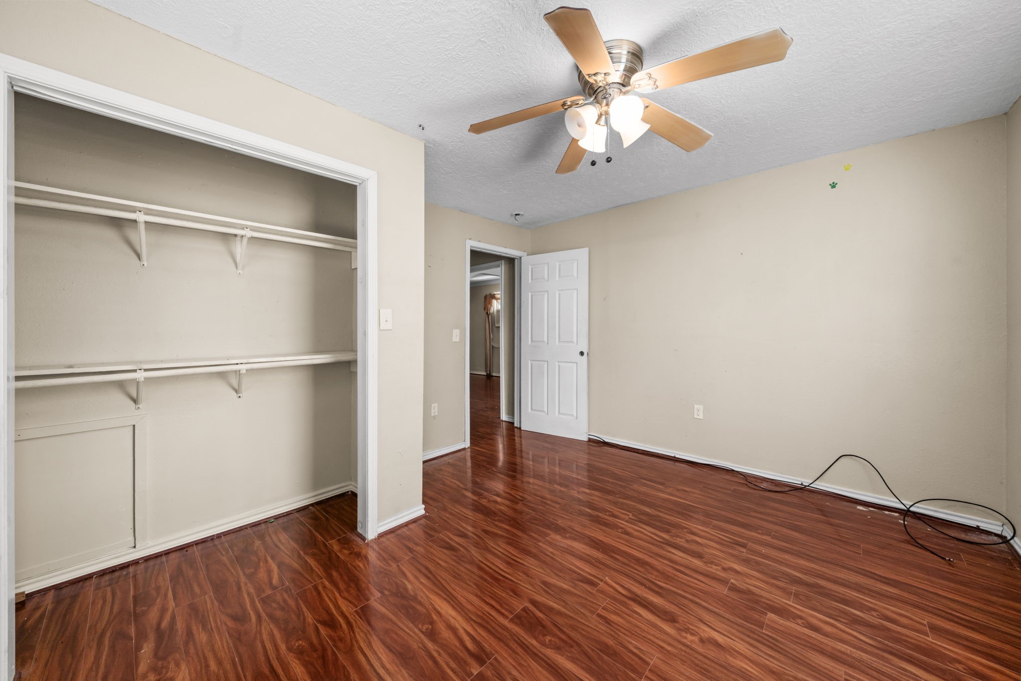 1814 Mansfield Street Houston, TX 77091 - Photo 17 of 29 a view of an empty room with wooden floor