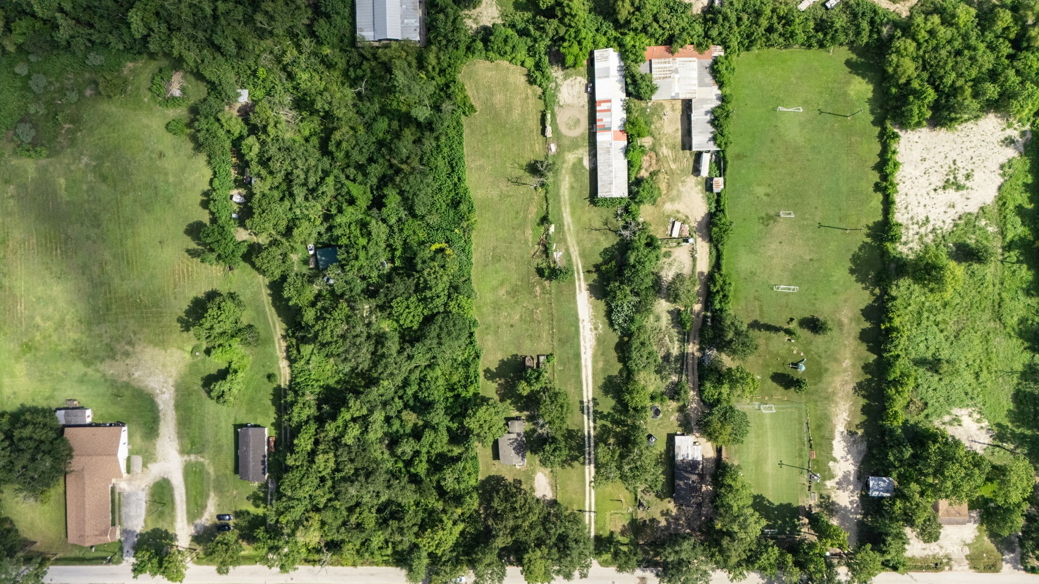 1814 Mansfield Street Houston, TX 77091 - Photo 2 of 29 an aerial view of residential houses with outdoor space and trees