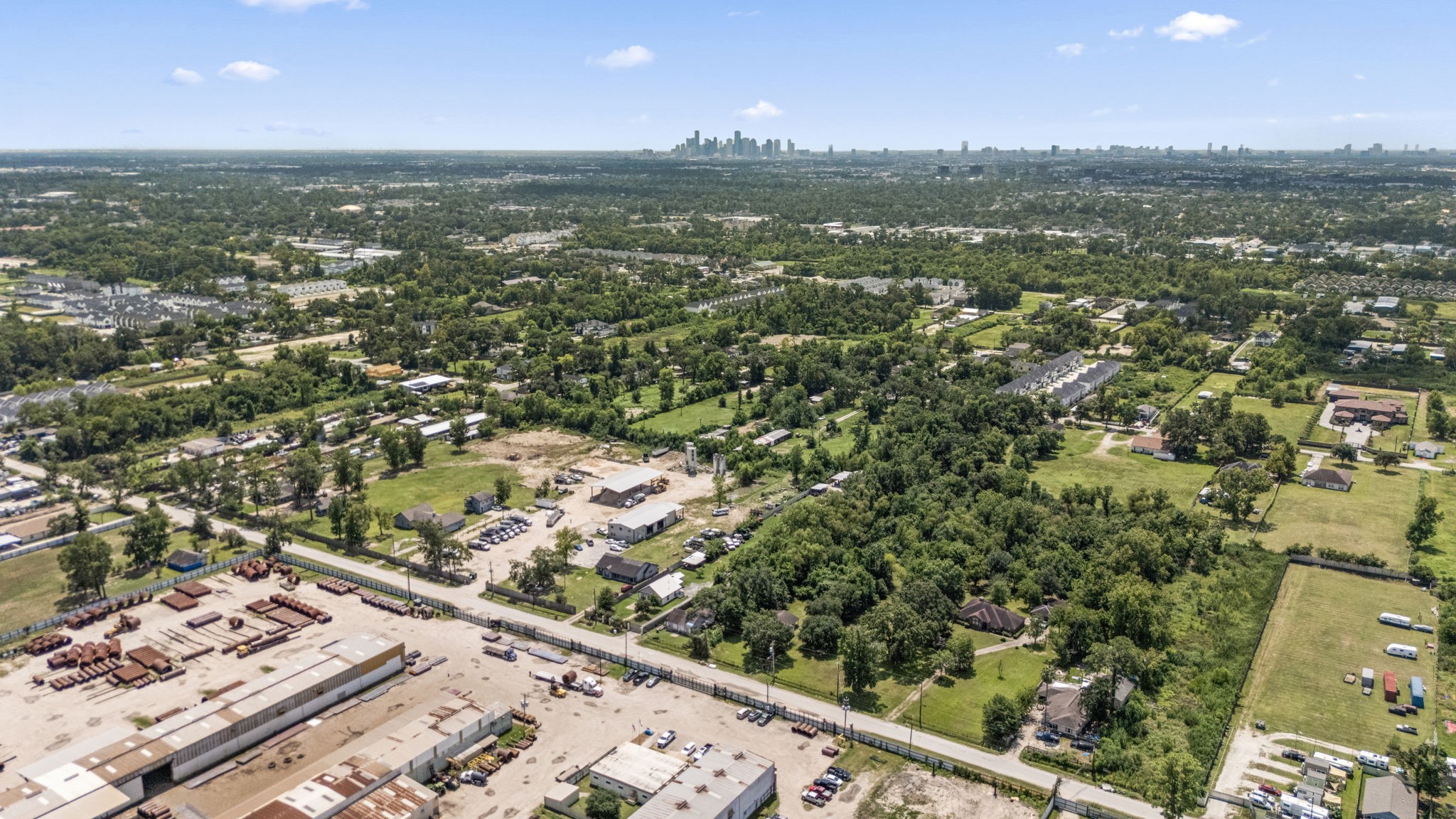 1814 Mansfield Street Houston, TX 77091 - Photo 22 of 29 an aerial view of residential houses with outdoor space and trees