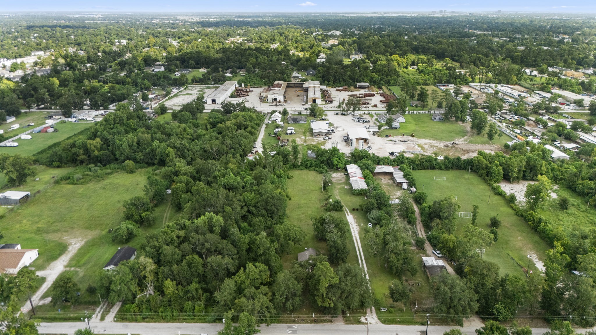 1814 Mansfield Street Houston, TX 77091 - Photo 28 of 29 an aerial view of residential houses with outdoor space and trees