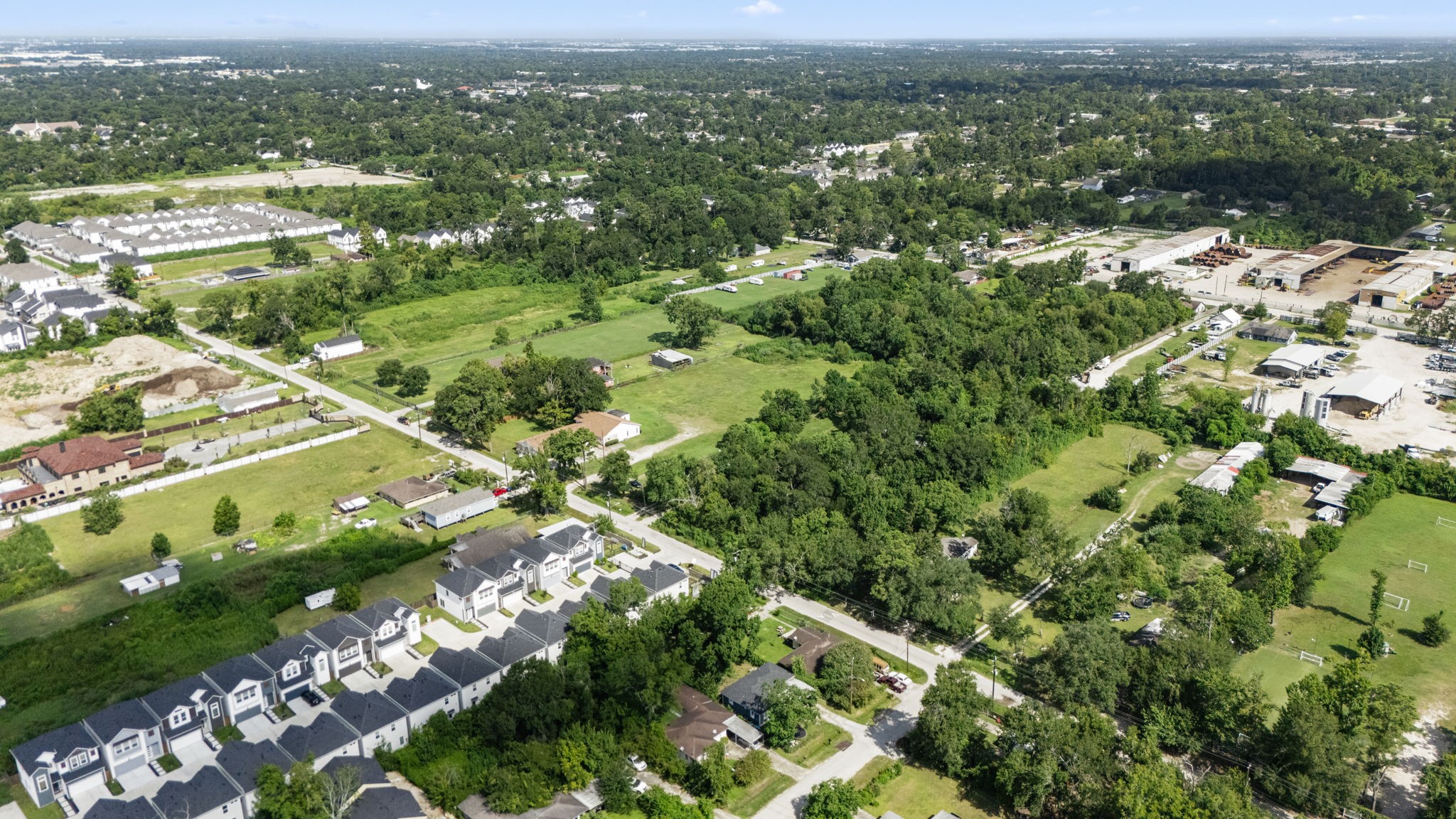 1814 Mansfield Street Houston, TX 77091 - Photo 4 of 29 an aerial view of residential houses with outdoor space and trees