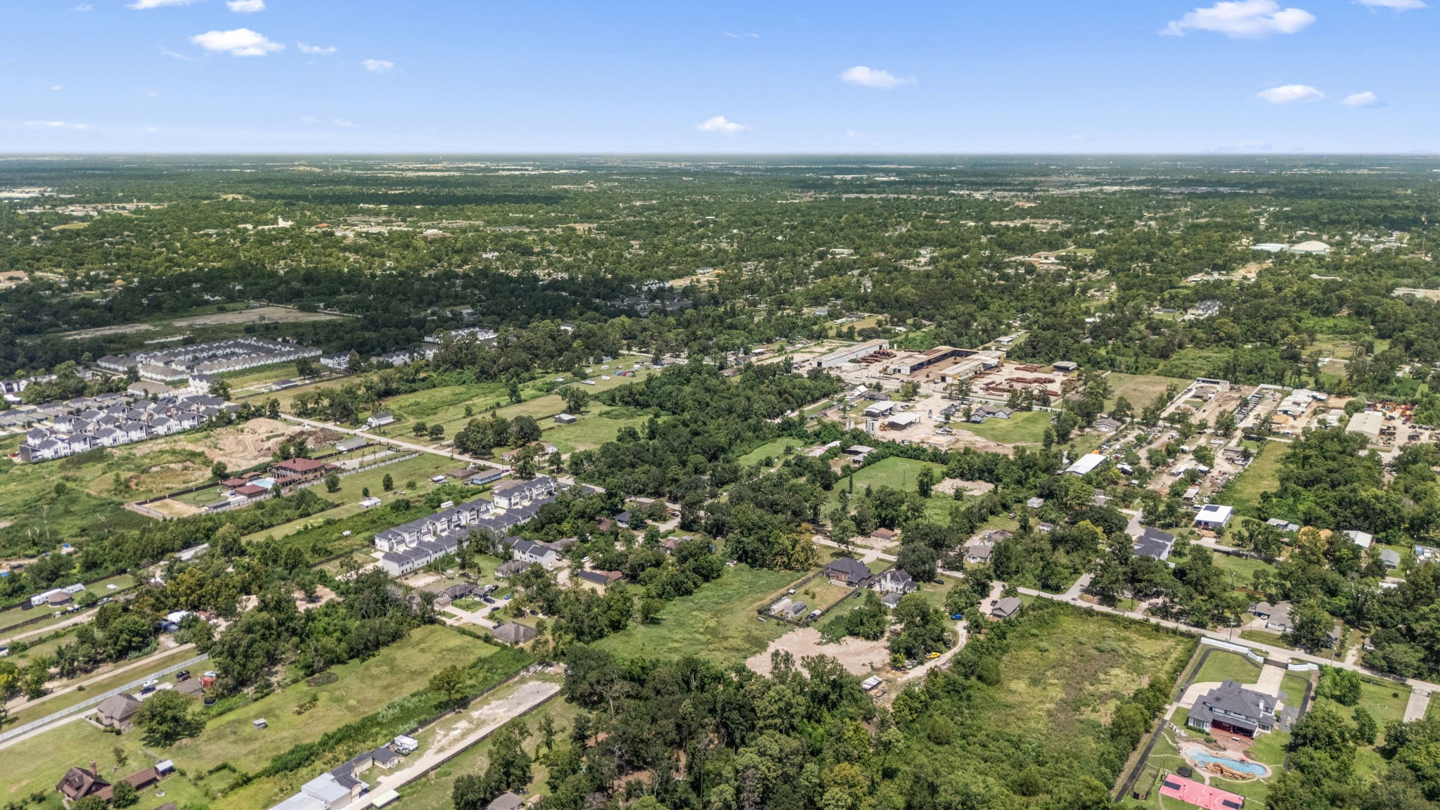 1814 Mansfield Street Houston, TX 77091 - Photo 5 of 29 a view of a city with lots of trees