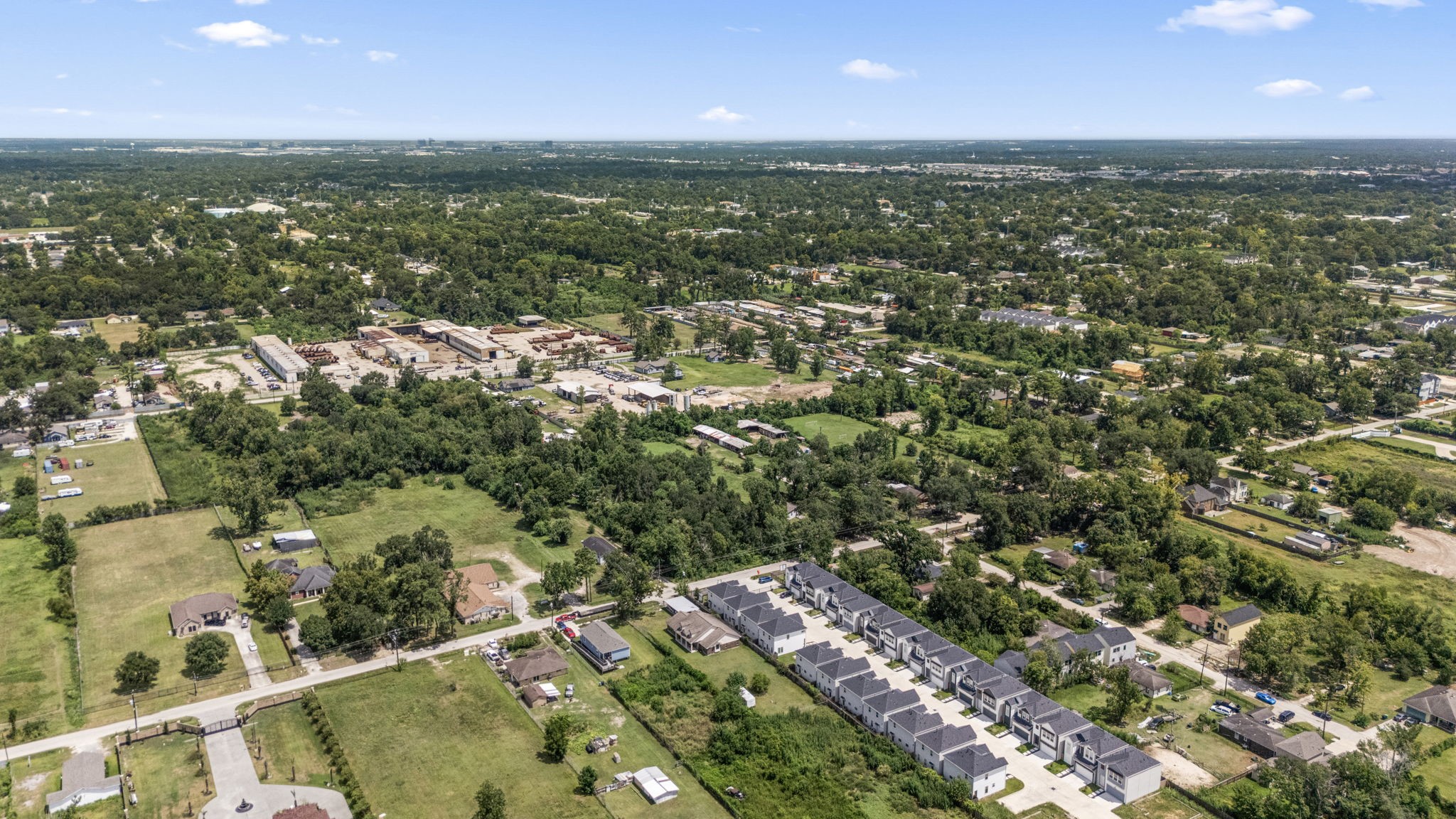 1814 Mansfield Street Houston, TX 77091 - Photo 6 of 29 an aerial view of residential houses with outdoor space and trees