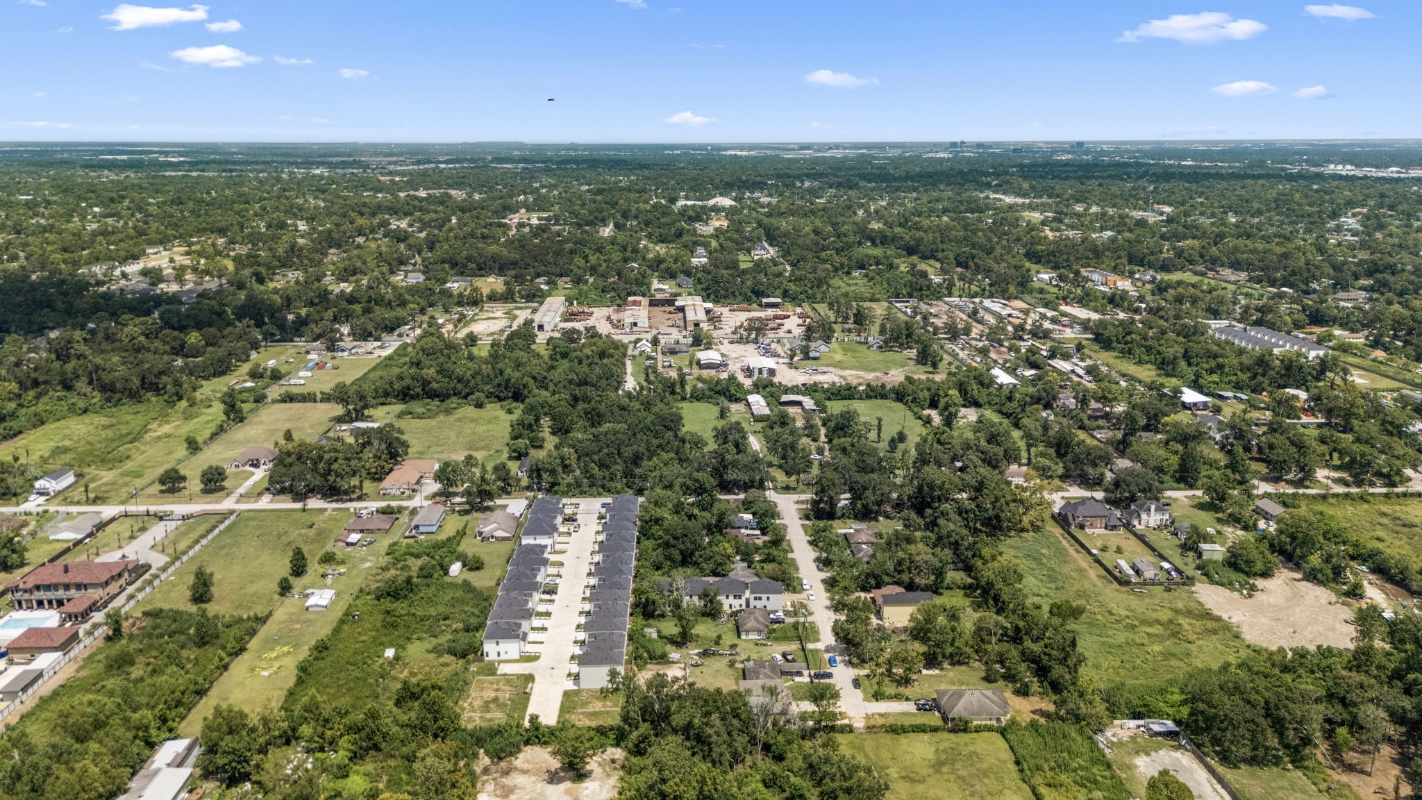1814 Mansfield Street Houston, TX 77091 - Photo 7 of 29 an aerial view of residential houses with outdoor space and trees