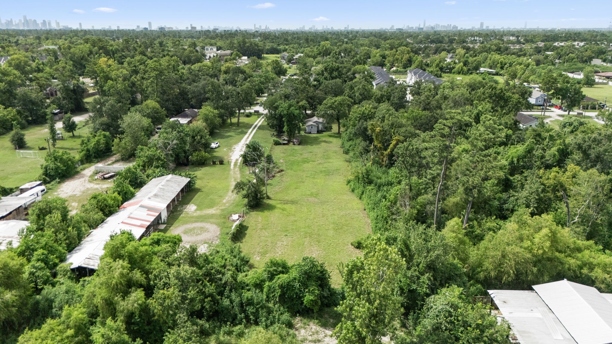 1814 Mansfield Street Houston, TX 77091 - Photo 9 of 29 an aerial view of residential houses with outdoor space and trees all around