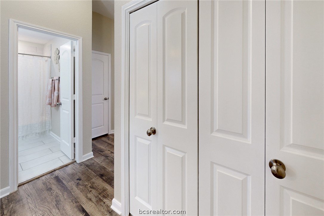 2071 Positano Loop Bryan, TX 77808 - Photo 20 of 31 a view of a bathroom from a hallway