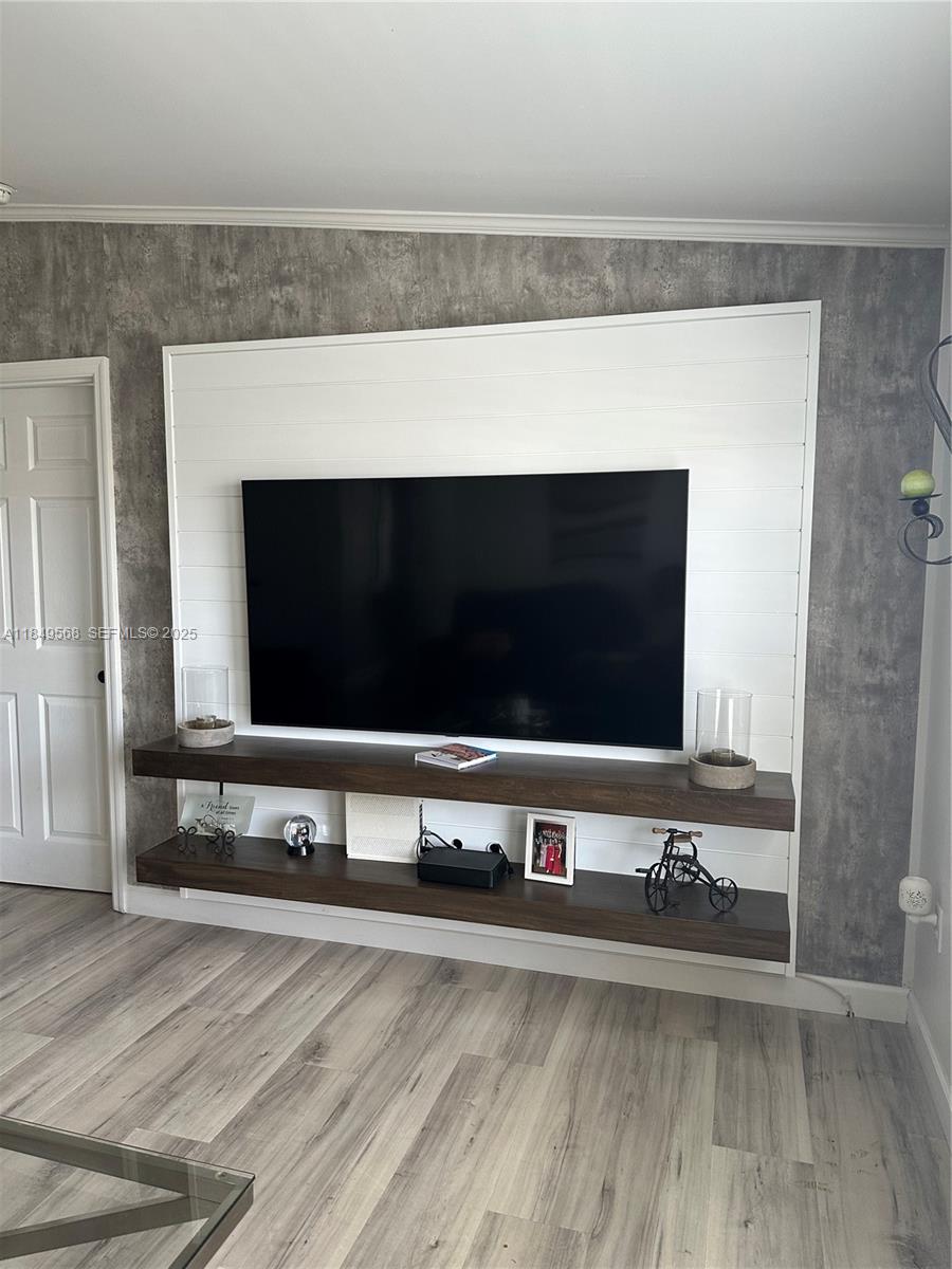1570 Southwest 64th Way Boca Raton, FL 33428 - Photo 17 of 24 a view of a living room with stainless steel appliances