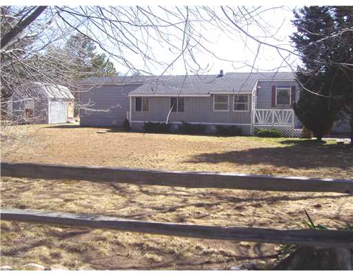 24 Airport Road Coventry, RI 02816 - Photo 3 of 9 Exterior Front. HUGE oversized corner lot setting for this expanded mobile home!