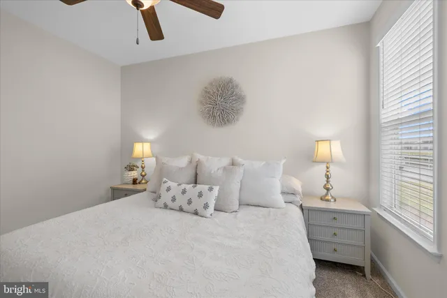 a dining room with furniture and a flat screen tv