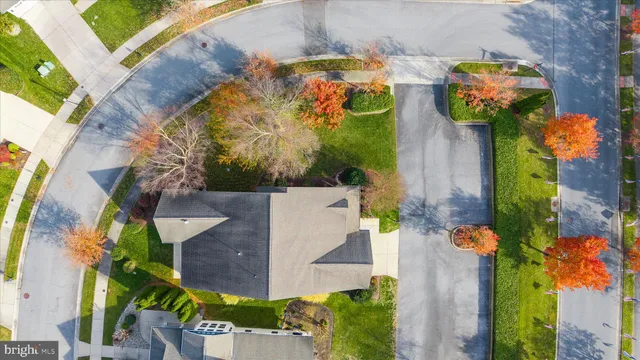a view of a swimming pool with outdoor seating