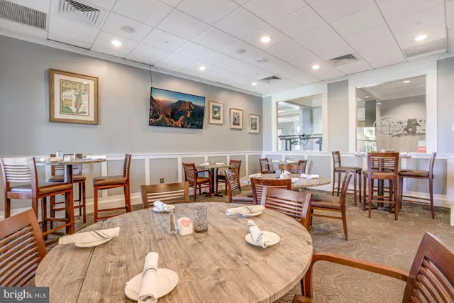 a view of a lake with houses in the back