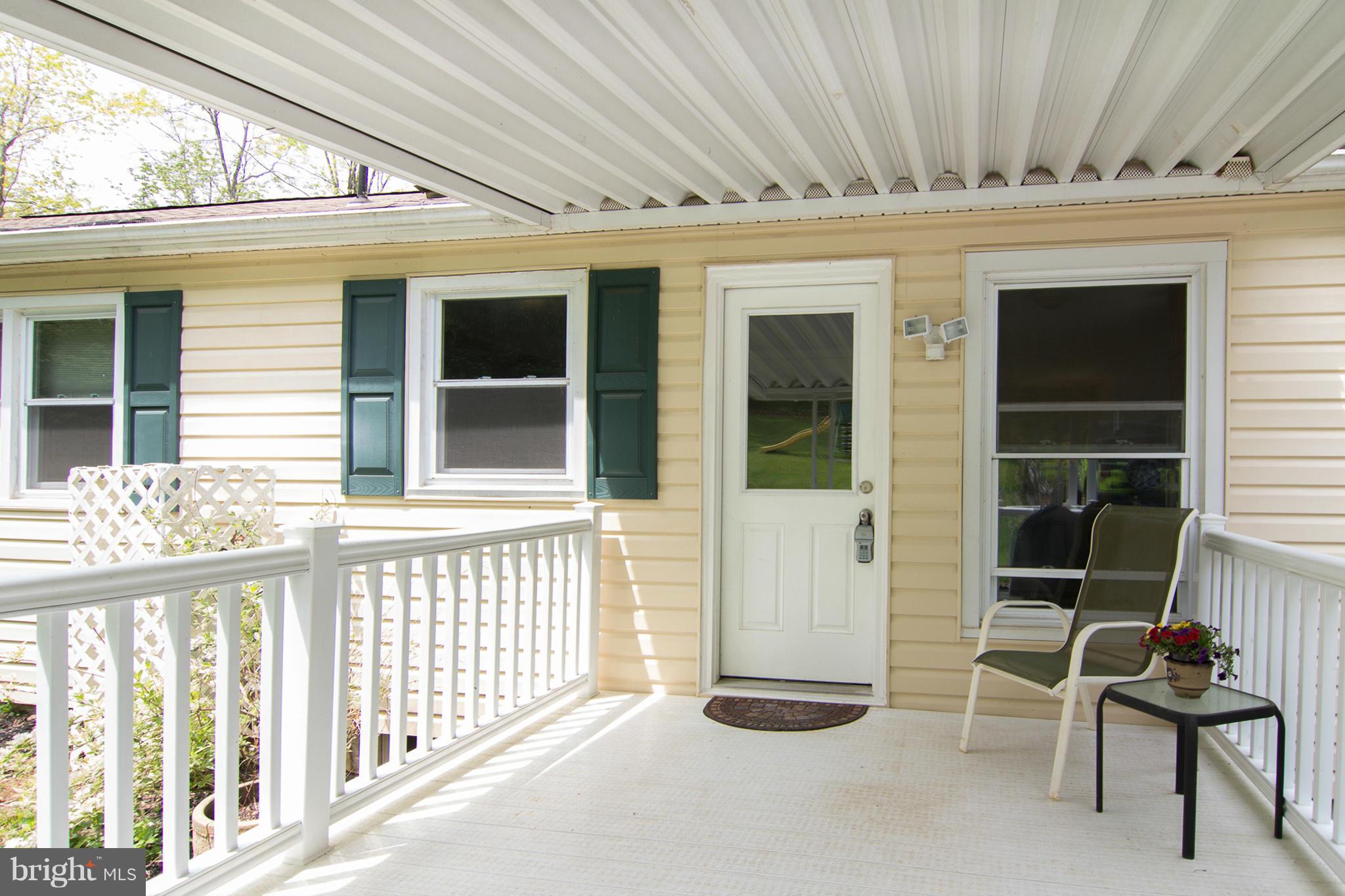 2203 Fridinger Mill Road Westminster, MD 21157 - Photo 26 of 29 Covered porch leads to Kitchen