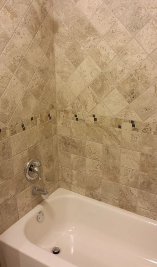 6330 107th Street Chicago Ridge, IL 60415 - Photo 21 of 27 a bathroom with a bathtub