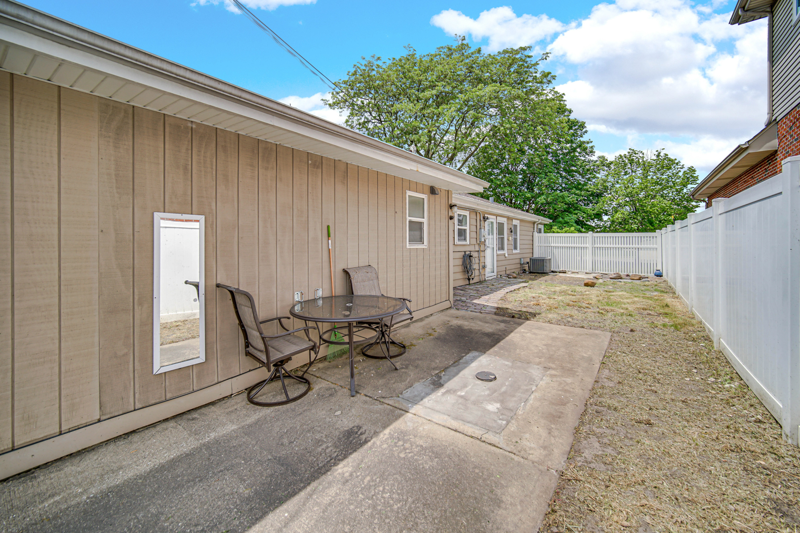 6330 107th Street Chicago Ridge, IL 60415 - Photo 25 of 27 a backyard of a house with outdoor seating