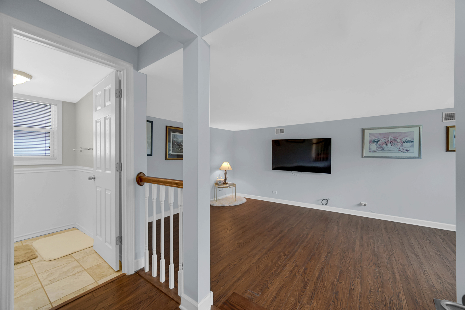6330 107th Street Chicago Ridge, IL 60415 - Photo 9 of 27 a living room with furniture and a flat screen tv