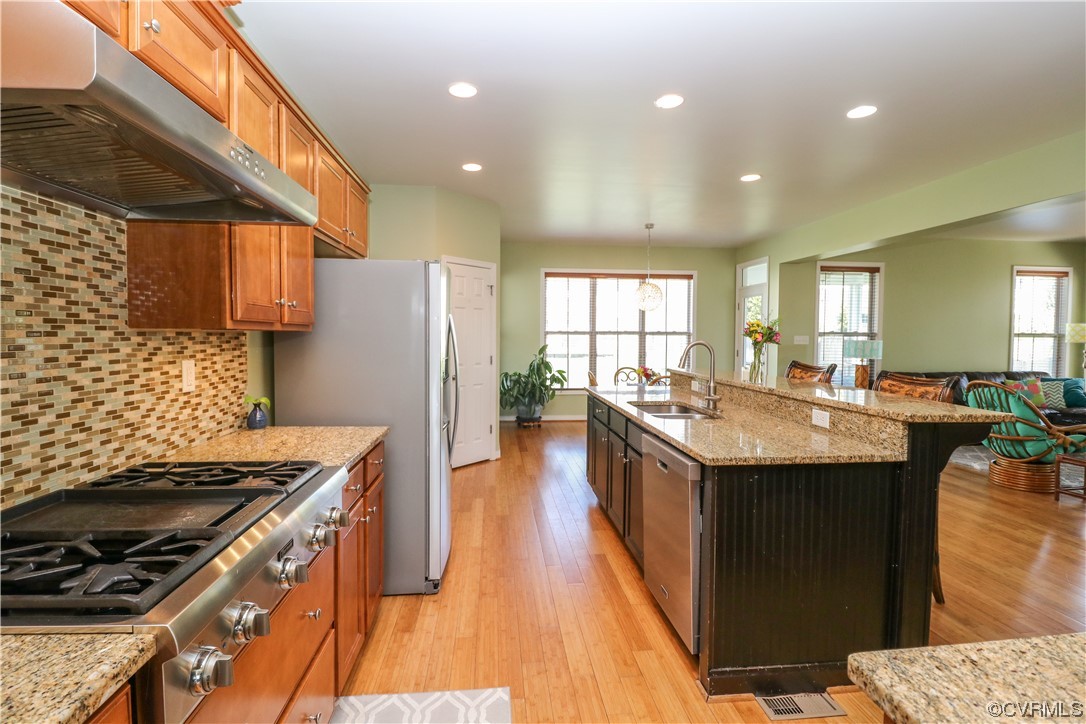 4628 Allenbend Road Glen Allen, VA 23060 - Photo 15 of 50 a kitchen with stainless steel appliances granite countertop a stove and a refrigerator