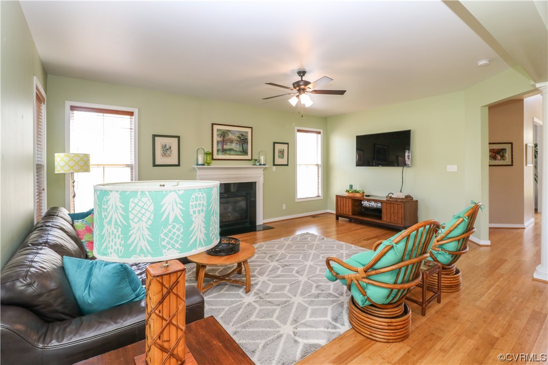 4628 Allenbend Road Glen Allen, VA 23060 - Photo 21 of 50 a living room with furniture a fireplace and a flat screen tv