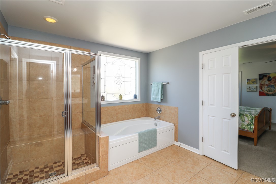 4628 Allenbend Road Glen Allen, VA 23060 - Photo 29 of 50 a bathroom with a tub shower and sink