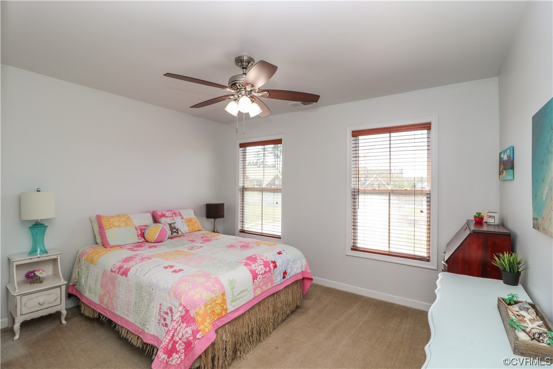 4628 Allenbend Road Glen Allen, VA 23060 - Photo 32 of 50 a bedroom with a bed and a window
