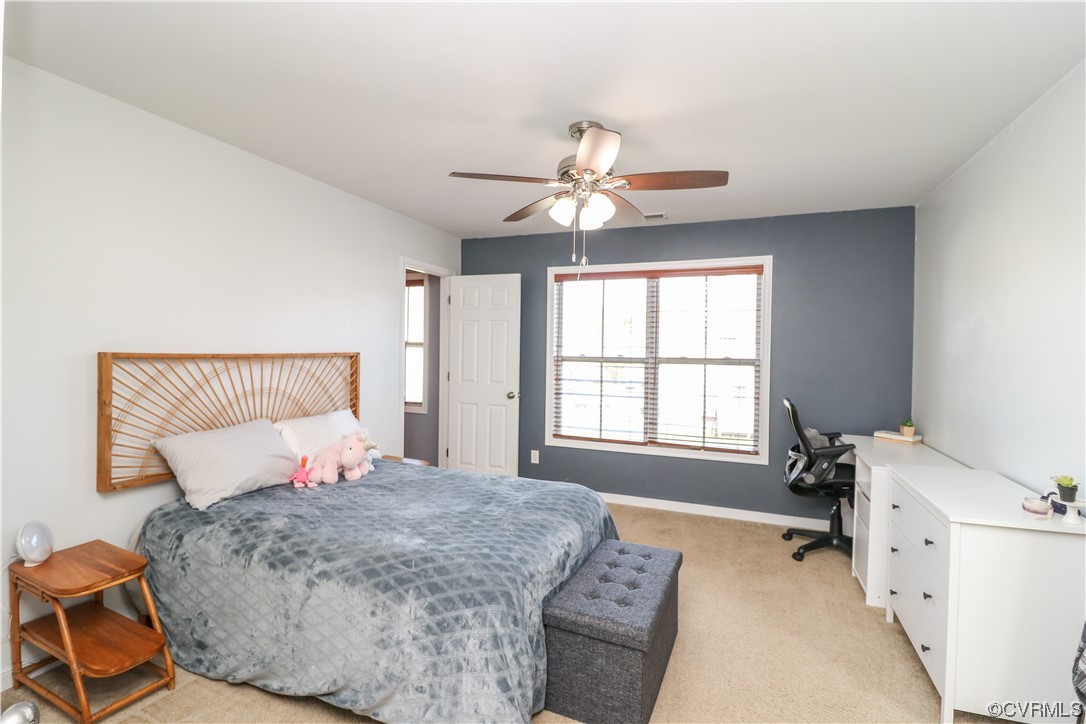 4628 Allenbend Road Glen Allen, VA 23060 - Photo 34 of 50 a bedroom with a bed and a large window