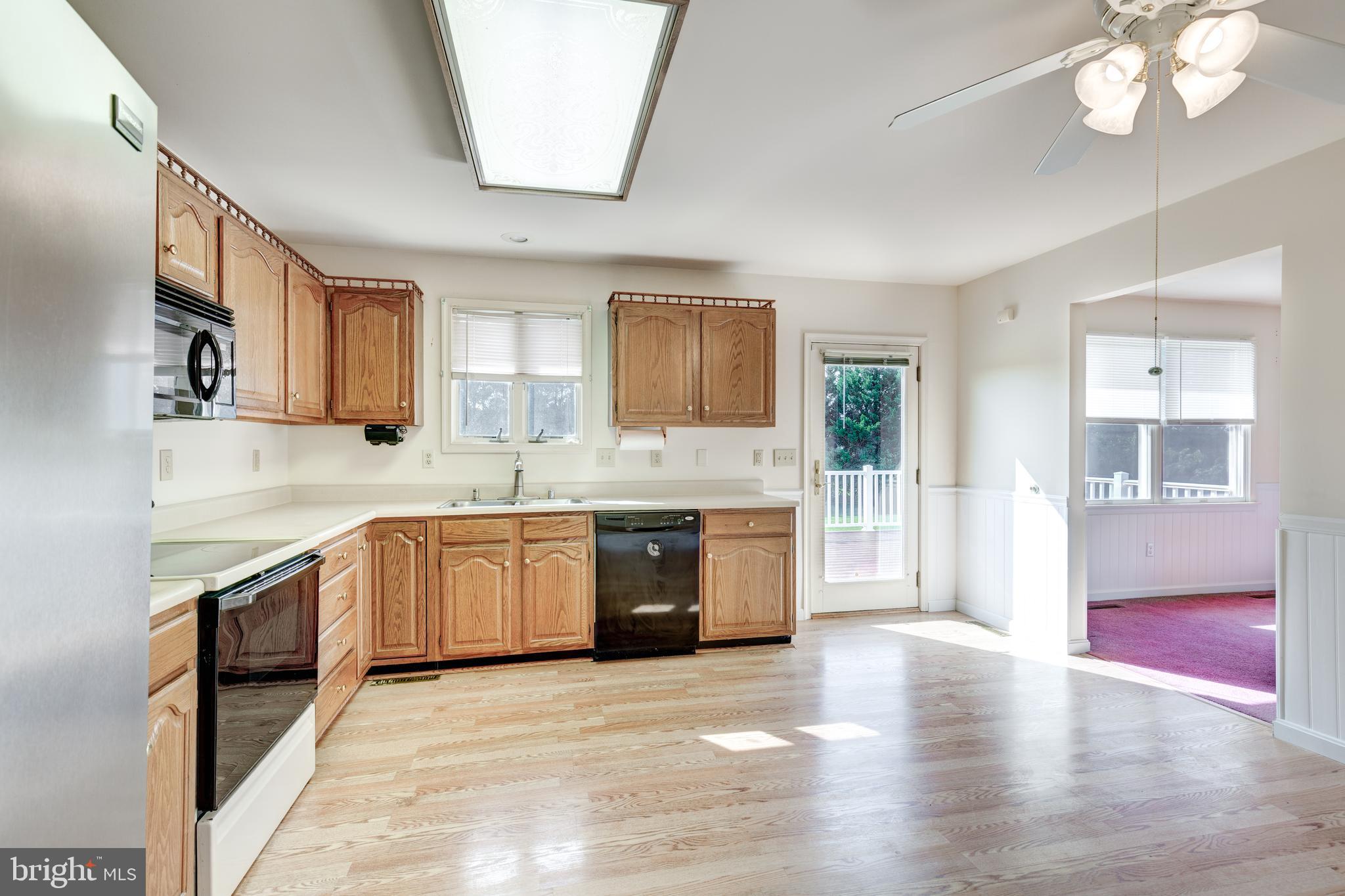 1915 Bachmans Valley Road Manchester, MD 21102 - Photo 7 of 47 Kitchen w/access to deck