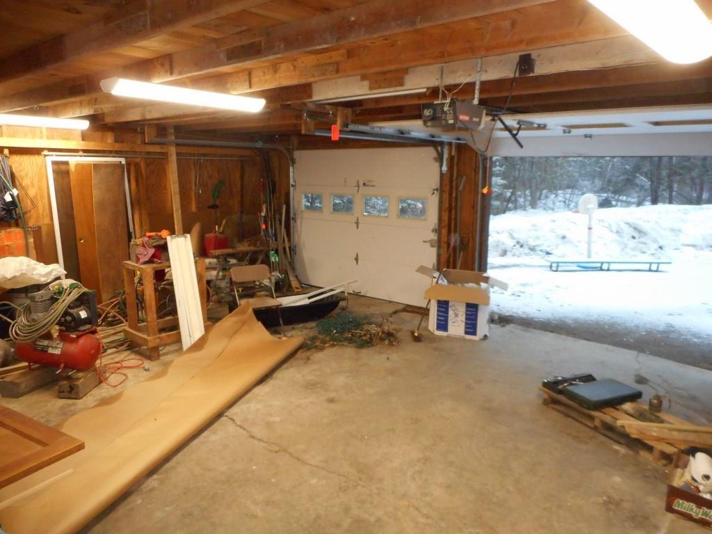497 Main Road Milford, ME 04461 - Photo 29 of 35 Even the trailer has a two car garage.