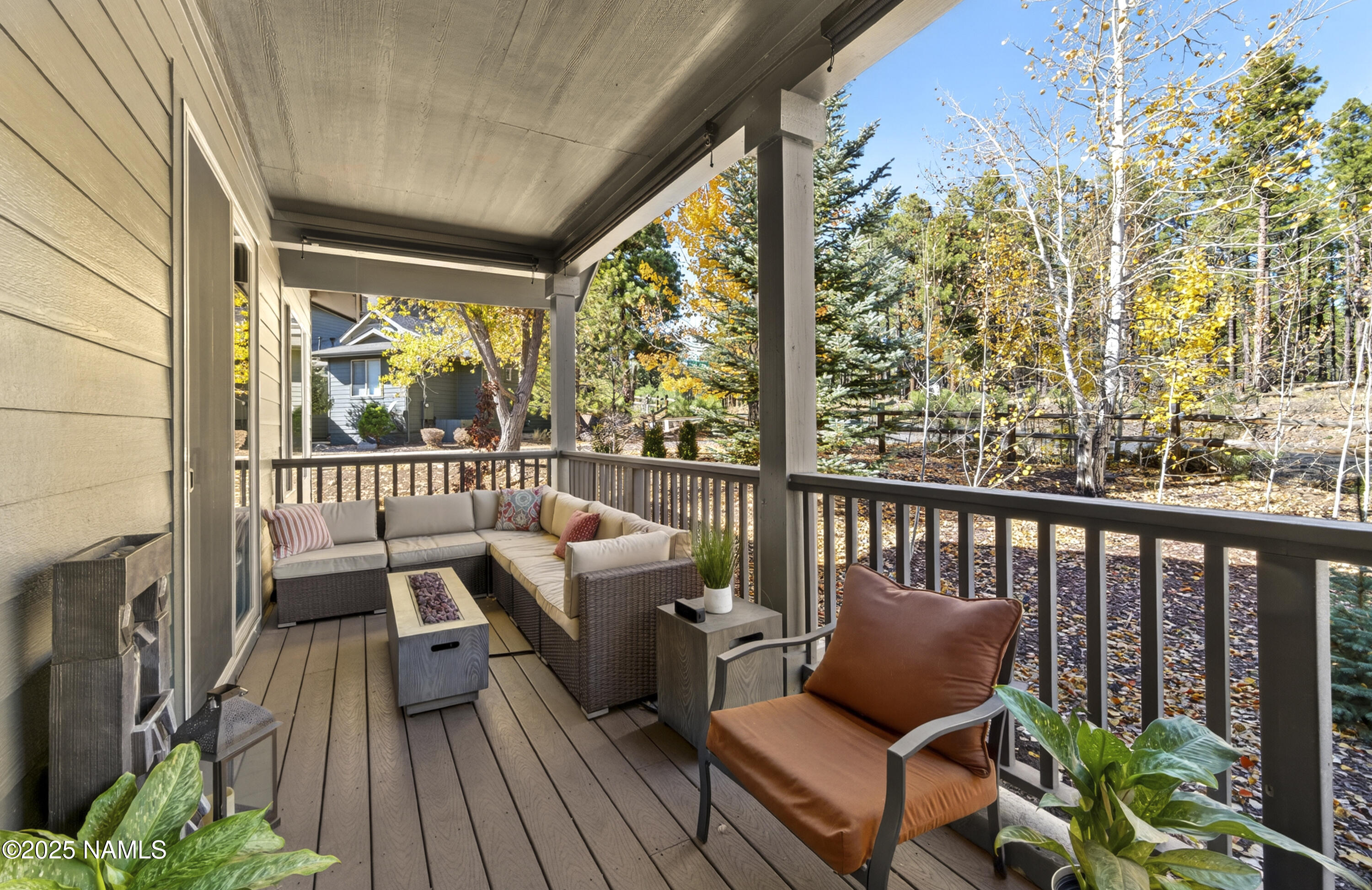 a view of a two chairs in the balcony