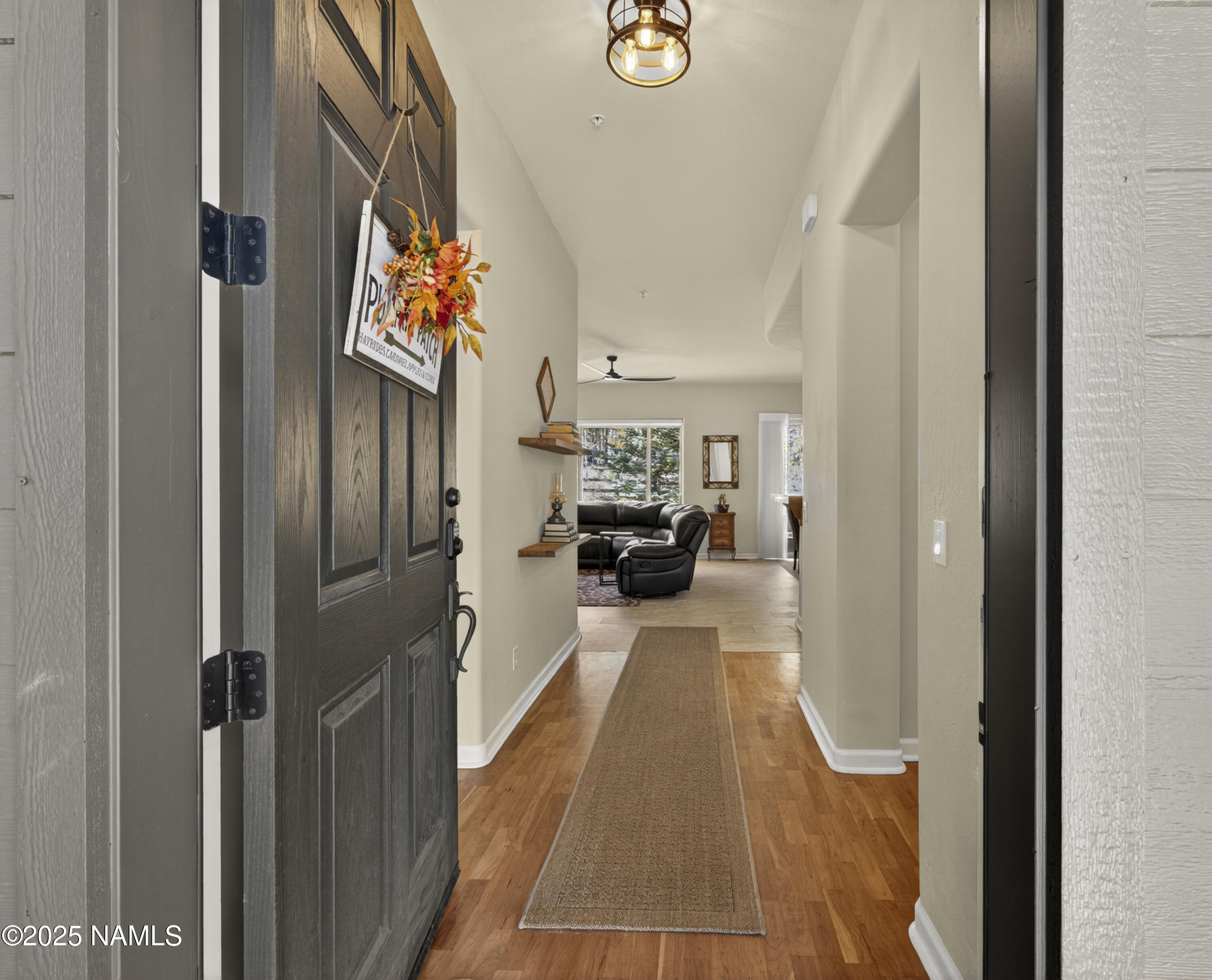 4900 West Quick Draw Flagstaff, AZ 86005 - Photo 14 of 36 a en suite bathroom with a sink and mirror