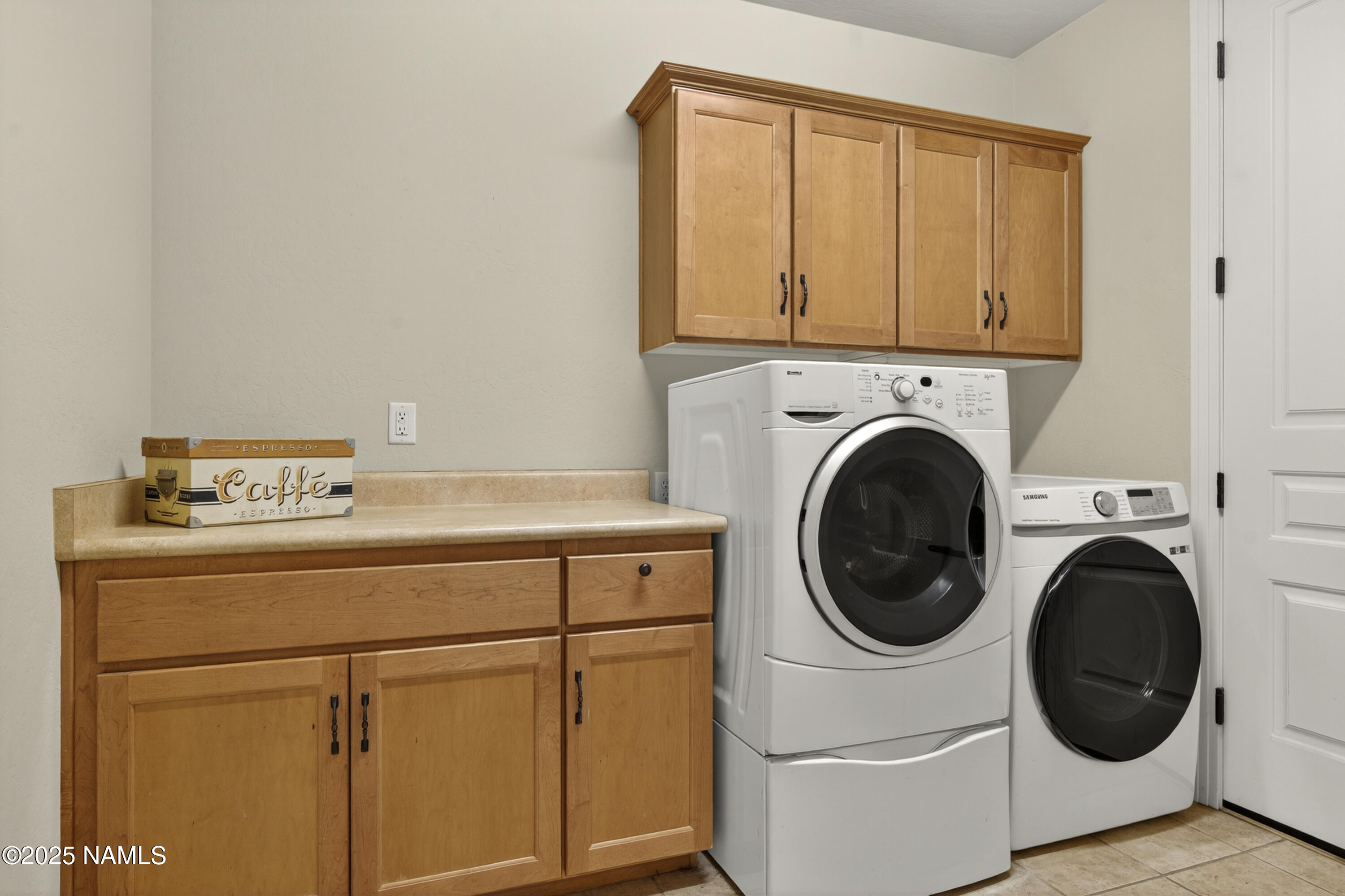 4900 West Quick Draw Flagstaff, AZ 86005 - Photo 19 of 36 a utility room with dryer and washer