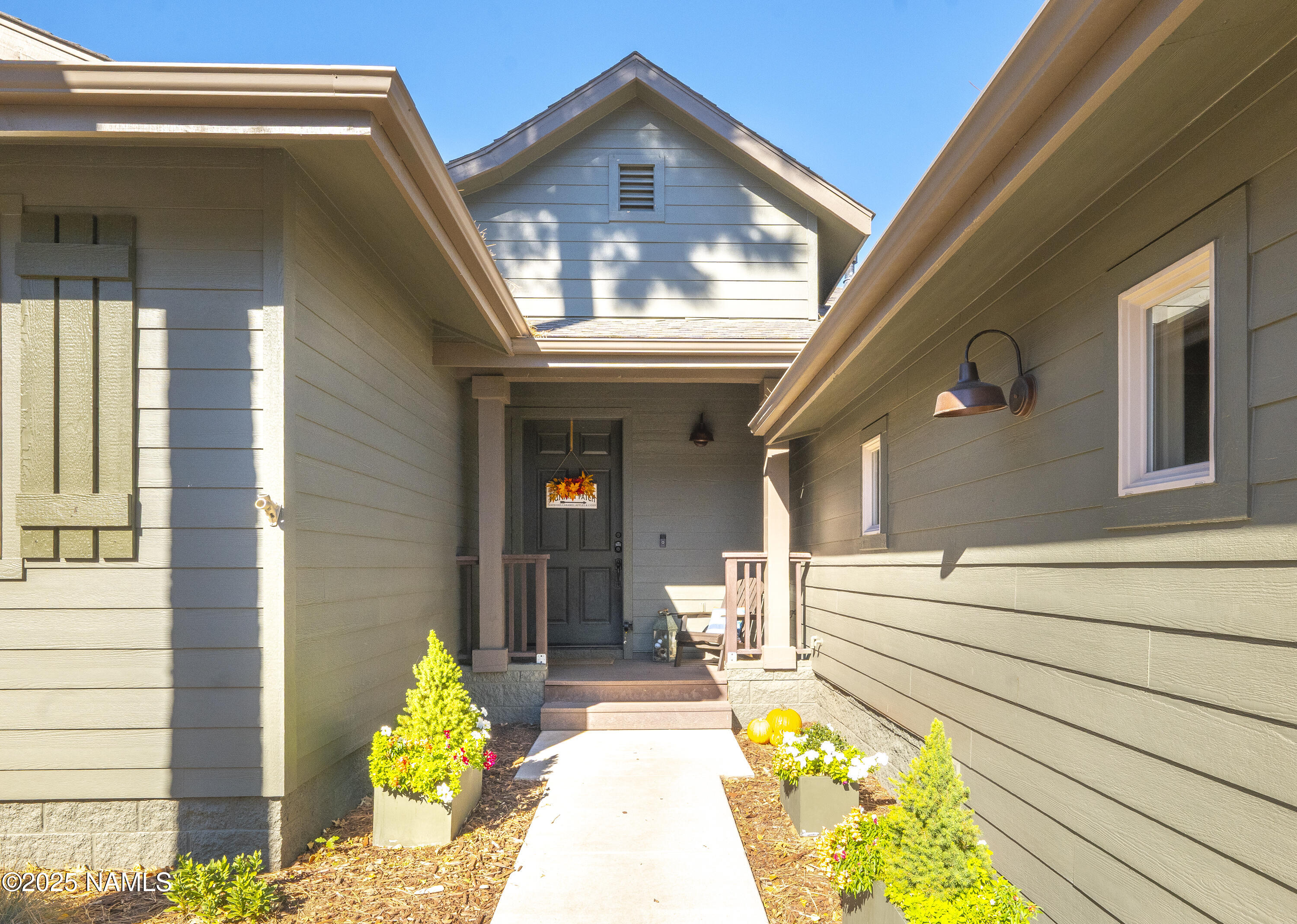 4900 West Quick Draw Flagstaff, AZ 86005 - Photo 21 of 36 a view of a house with a swimming pool