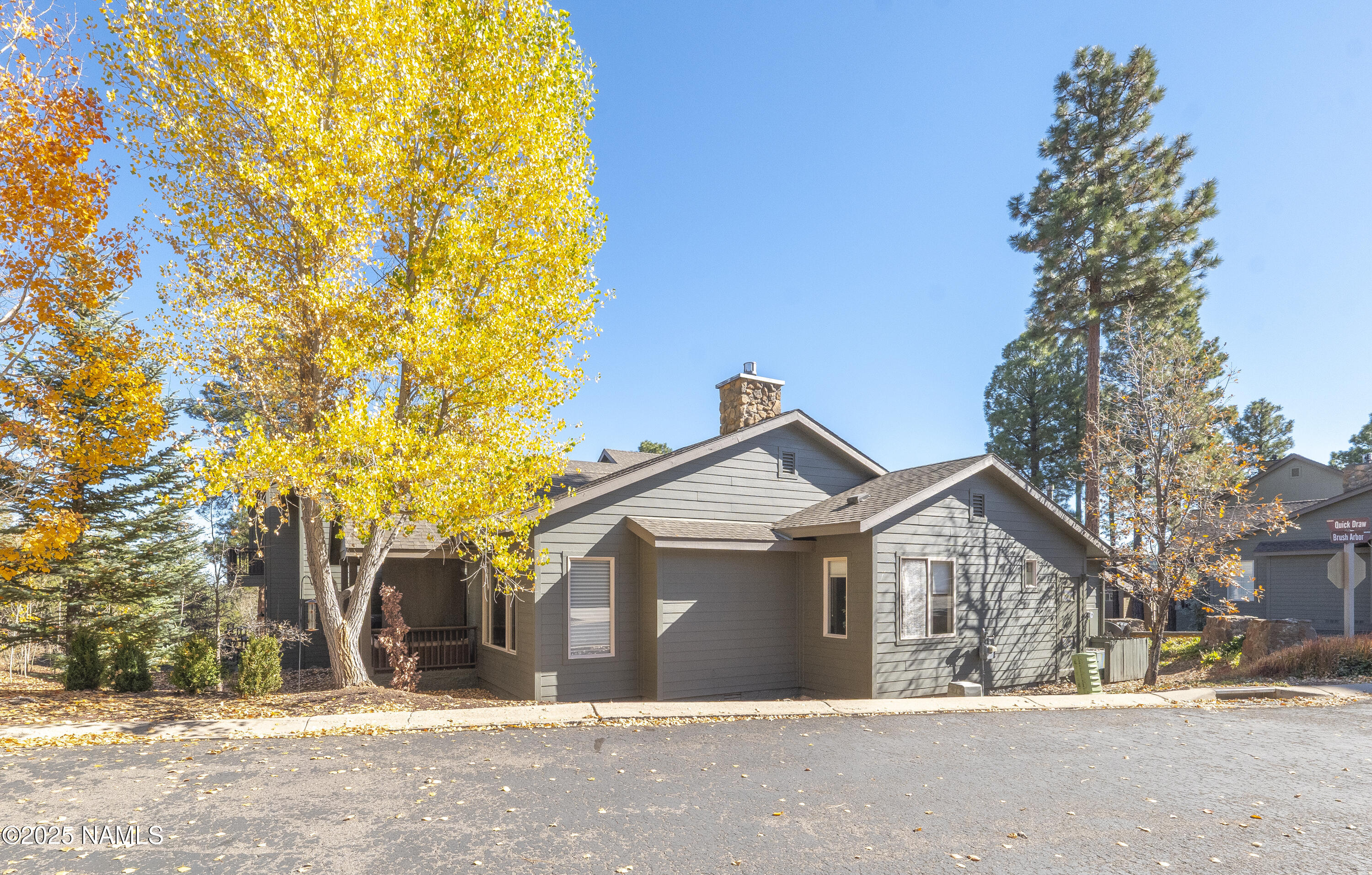 4900 West Quick Draw Flagstaff, AZ 86005 - Photo 22 of 36 a view of a house with a yard