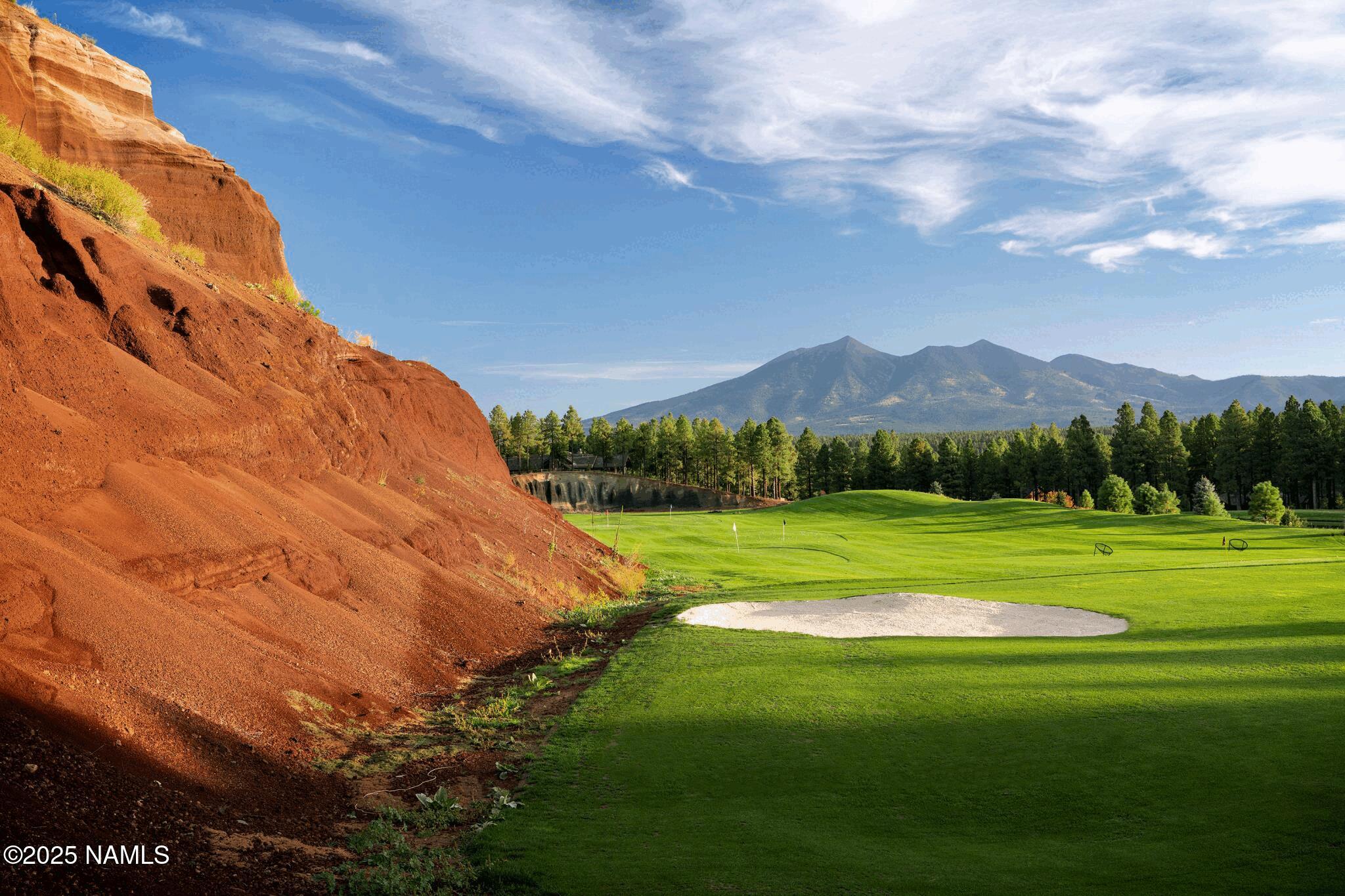 4900 West Quick Draw Flagstaff, AZ 86005 - Photo 33 of 36 a view of a golf course with a garden