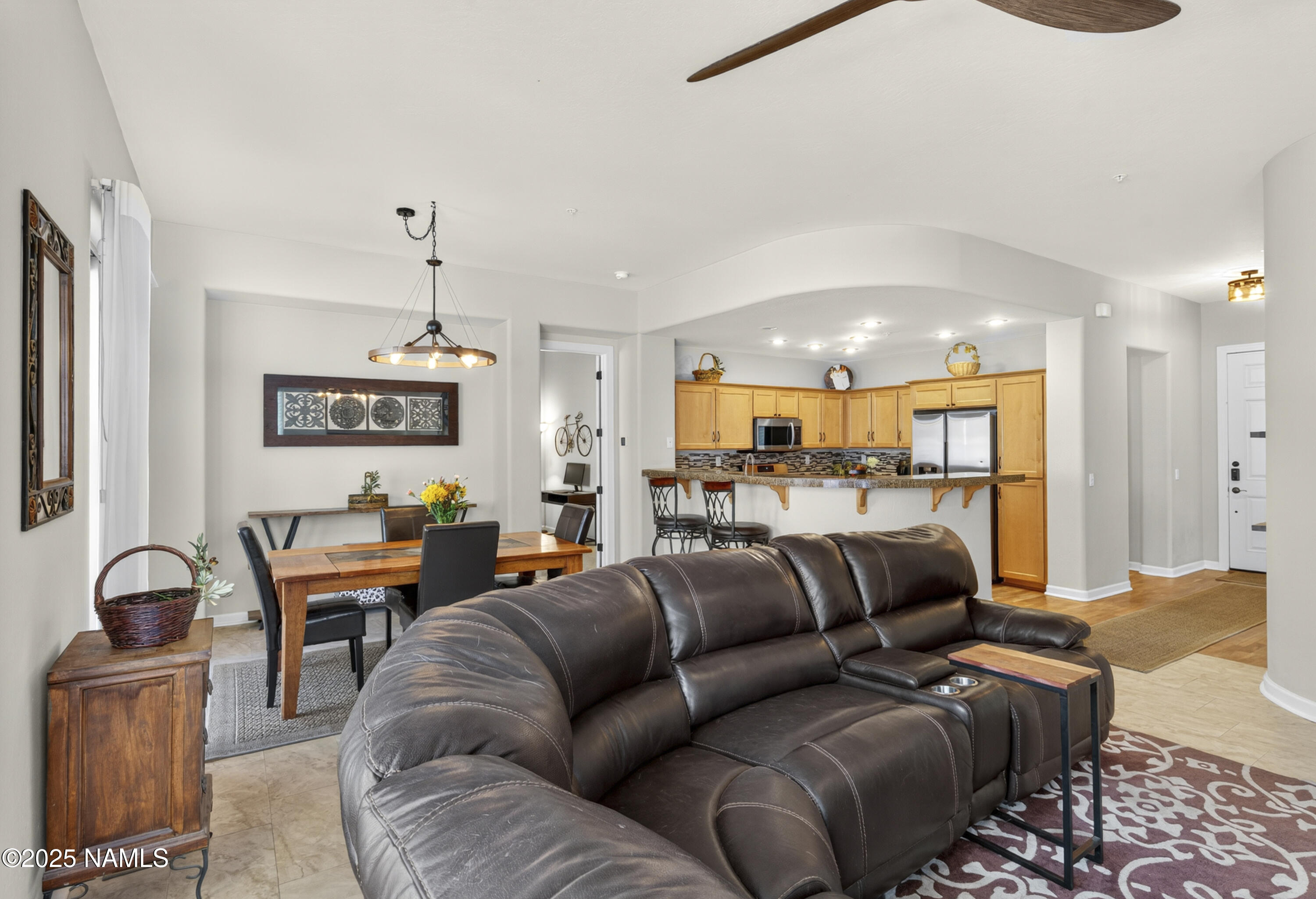 4900 West Quick Draw Flagstaff, AZ 86005 - Photo 35 of 36 a living room with furniture and kitchen view