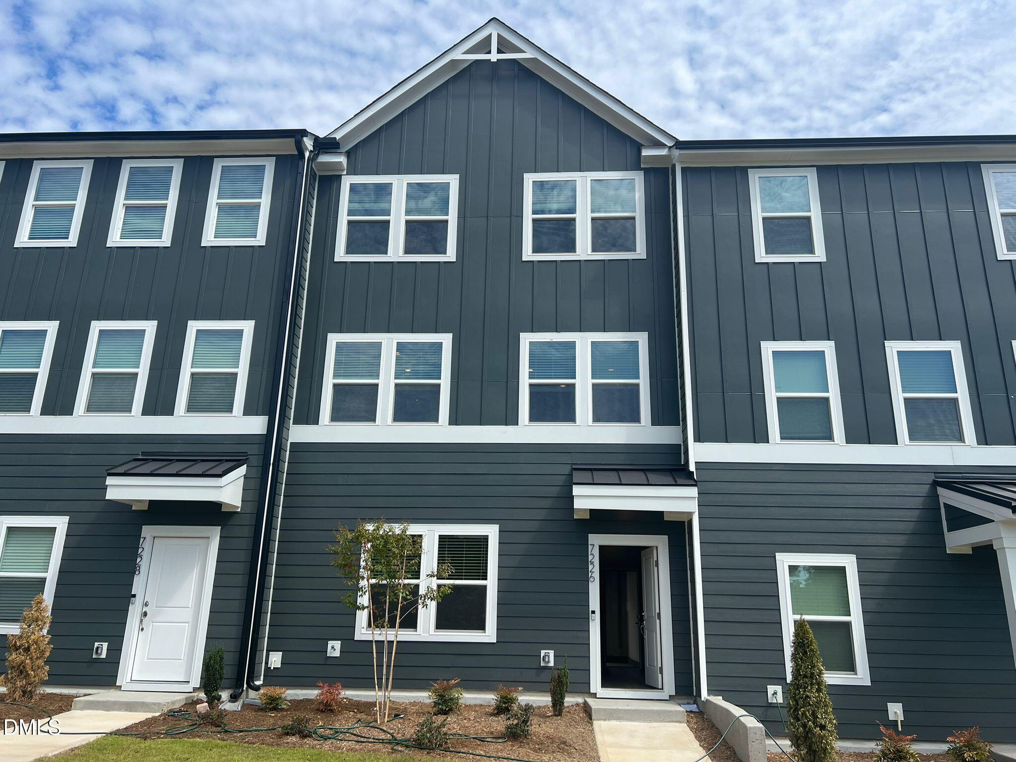 7226 Morris Acres Road Apex, NC 27523 - Photo 1 of 41 a front view of a building