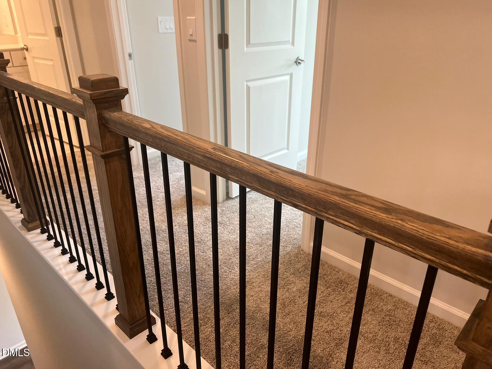 7226 Morris Acres Road Apex, NC 27523 - Photo 19 of 41 a view of a balcony with wooden floor