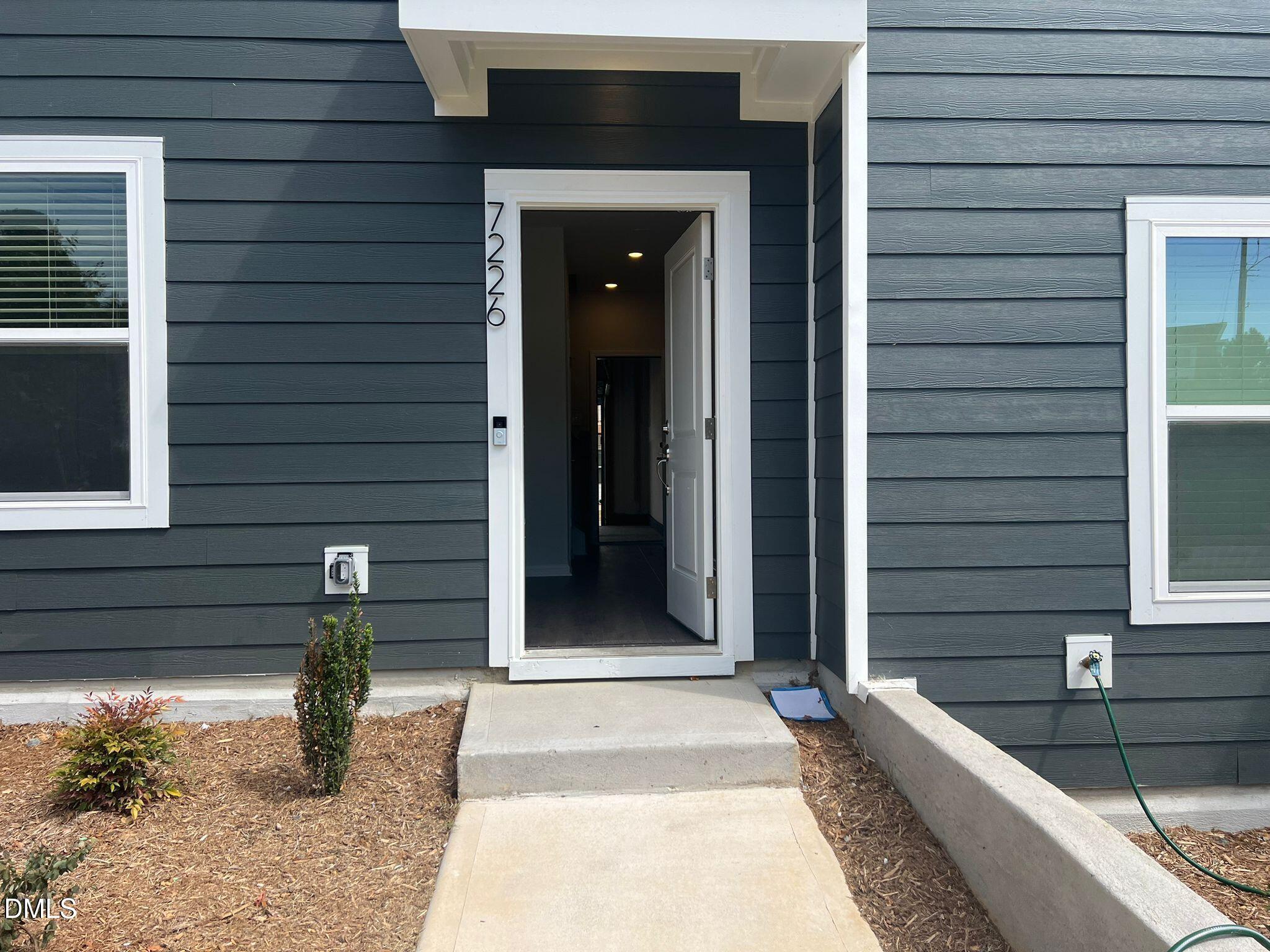 7226 Morris Acres Road Apex, NC 27523 - Photo 2 of 41 a view of entrance door of the house