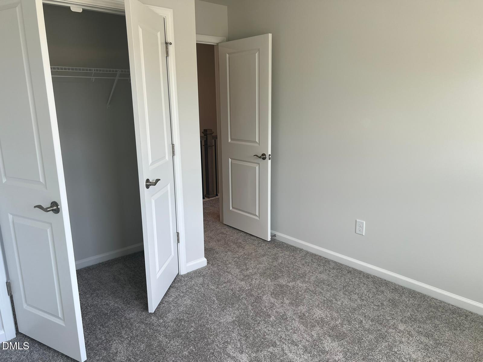 7226 Morris Acres Road Apex, NC 27523 - Photo 21 of 41 an empty room with windows