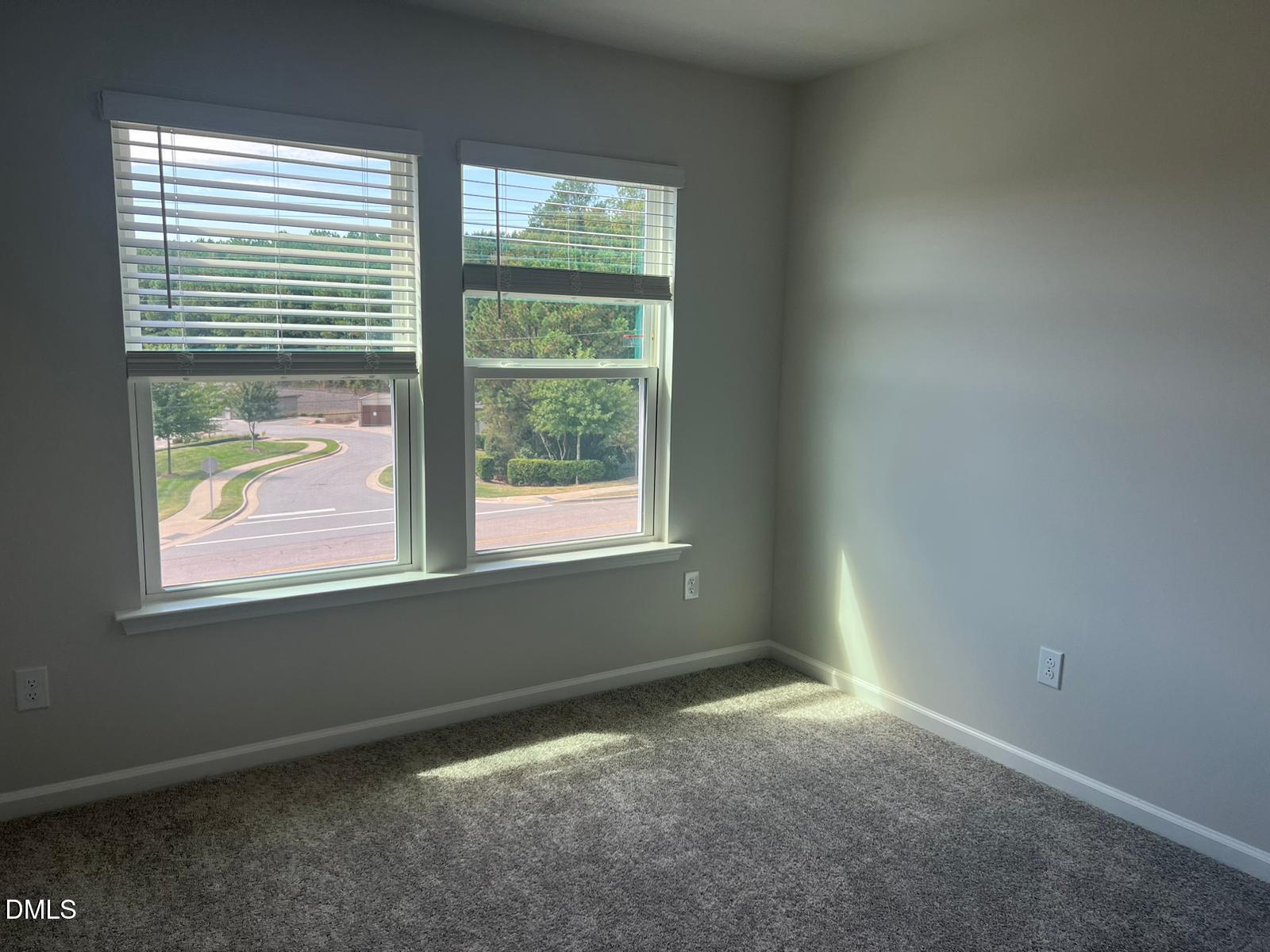 7226 Morris Acres Road Apex, NC 27523 - Photo 24 of 41 an empty room with a window