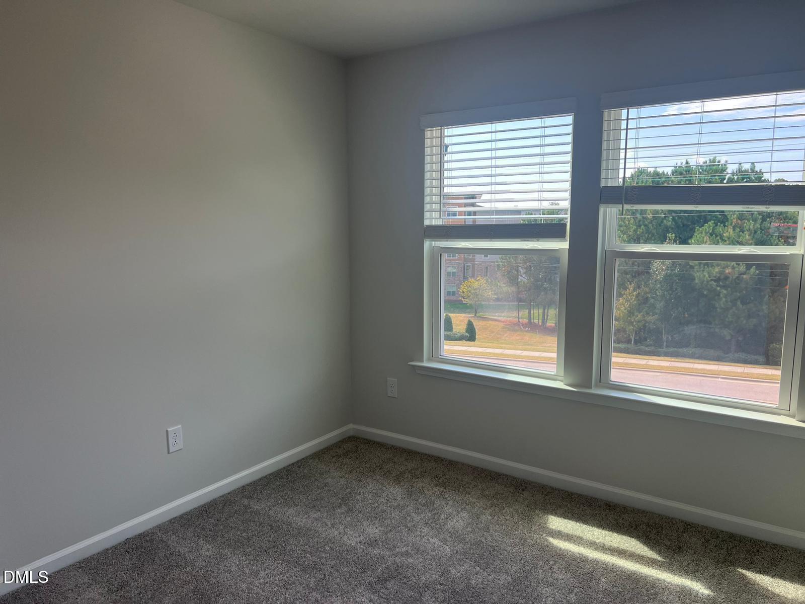 7226 Morris Acres Road Apex, NC 27523 - Photo 29 of 41 an empty room with a window