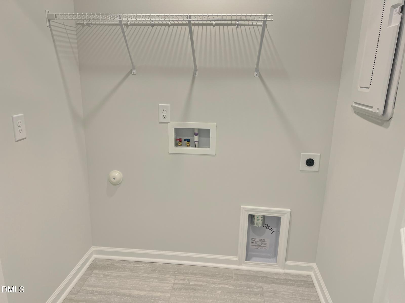 7226 Morris Acres Road Apex, NC 27523 - Photo 31 of 41 a view of a room with wooden floor