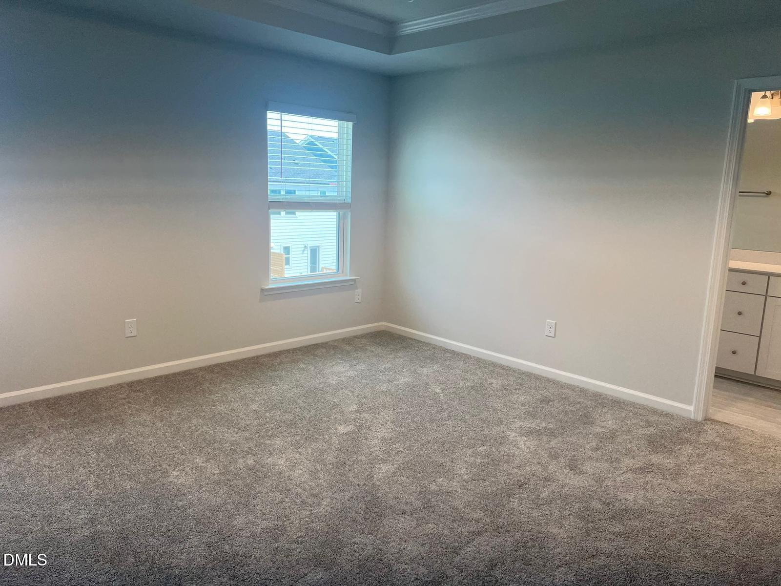 7226 Morris Acres Road Apex, NC 27523 - Photo 32 of 41 an empty room with a window