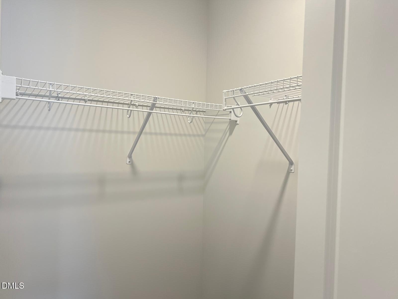 7226 Morris Acres Road Apex, NC 27523 - Photo 33 of 41 a view of a room with stairs