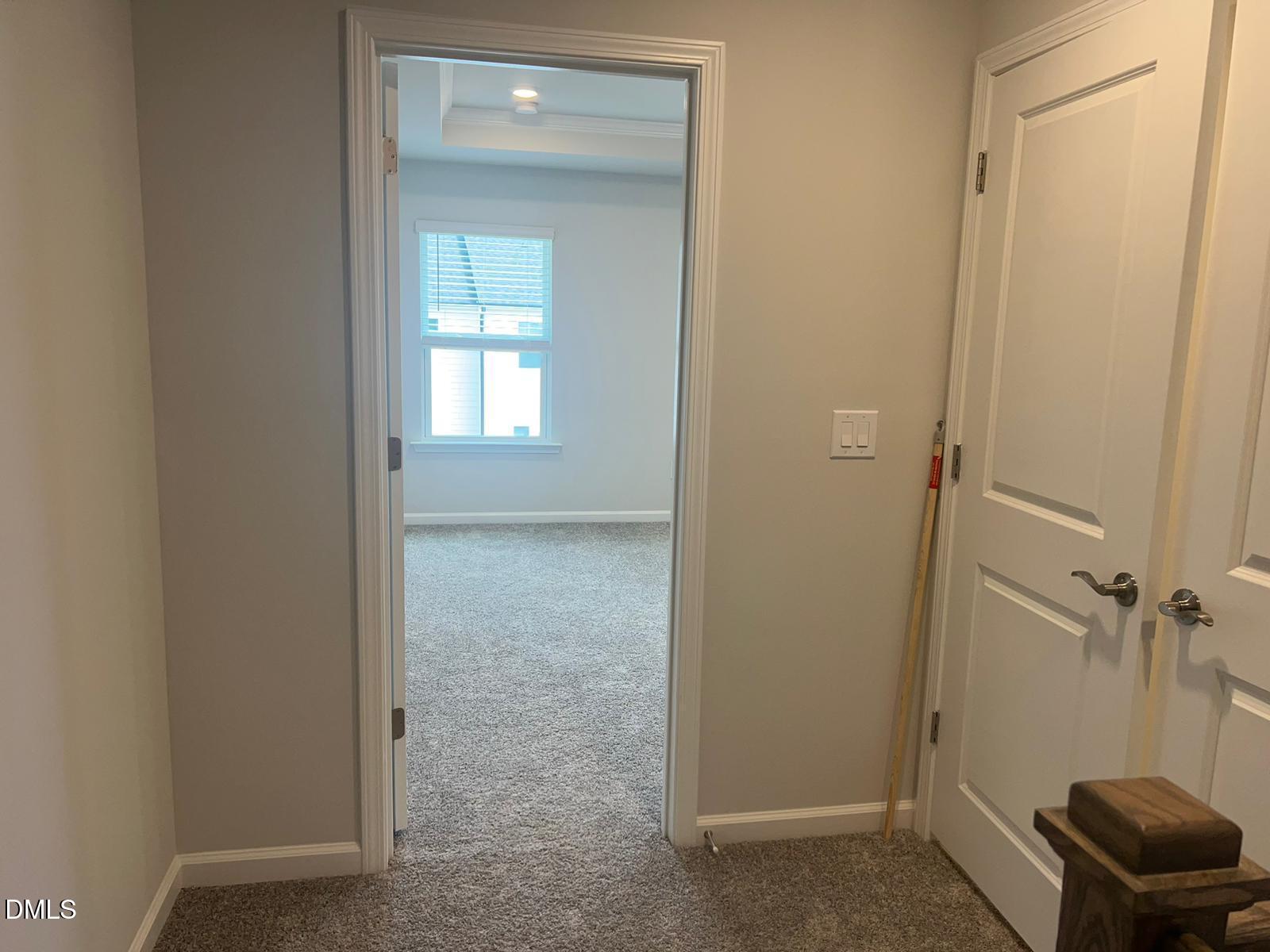 7226 Morris Acres Road Apex, NC 27523 - Photo 35 of 41 a view of a hallway with closet
